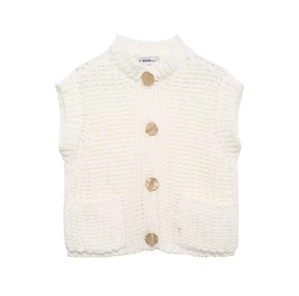 White knitted sleeveless vest with four large beige buttons down the front.