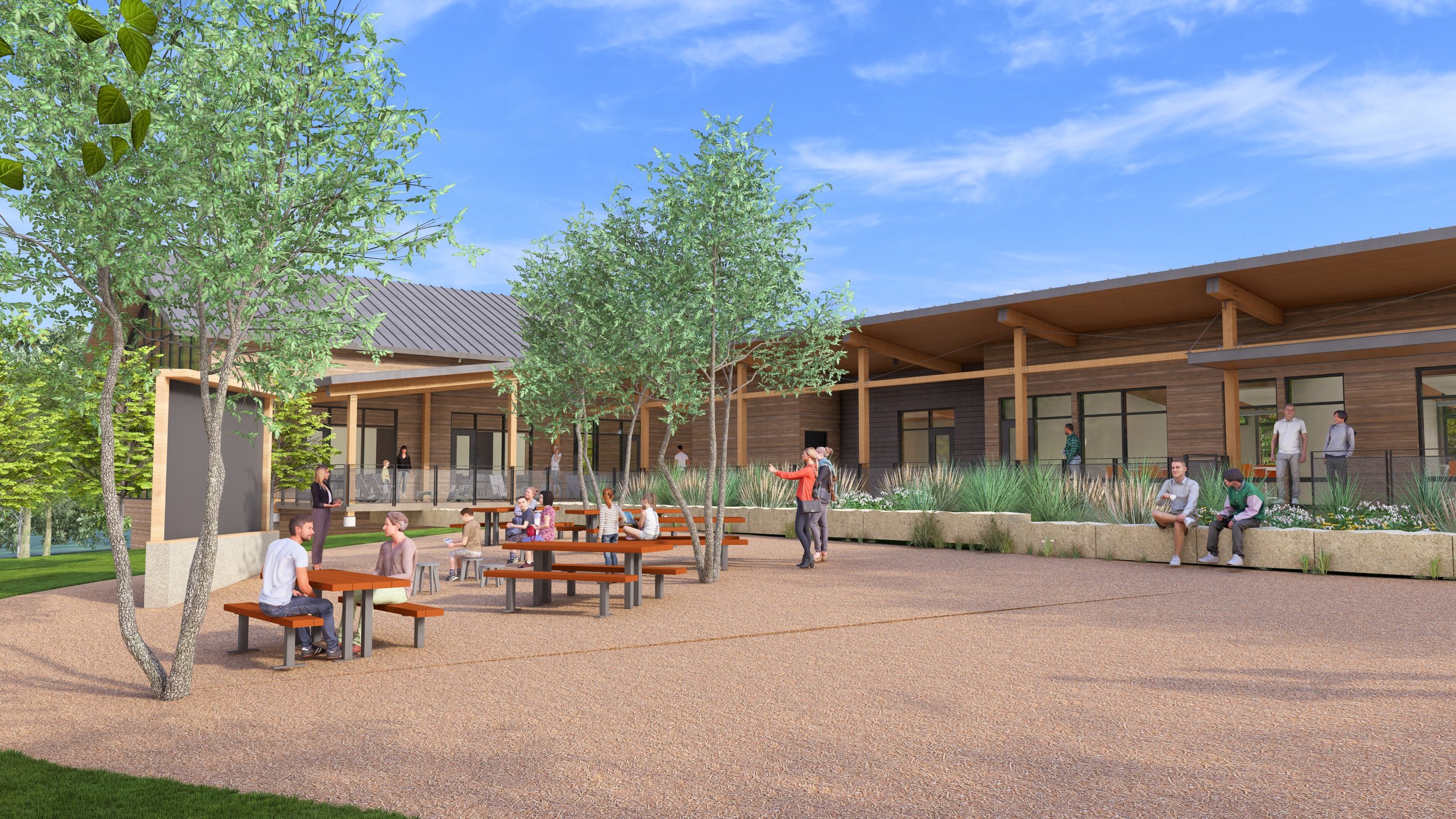 New wooden building with visitors in the outdoor seating area