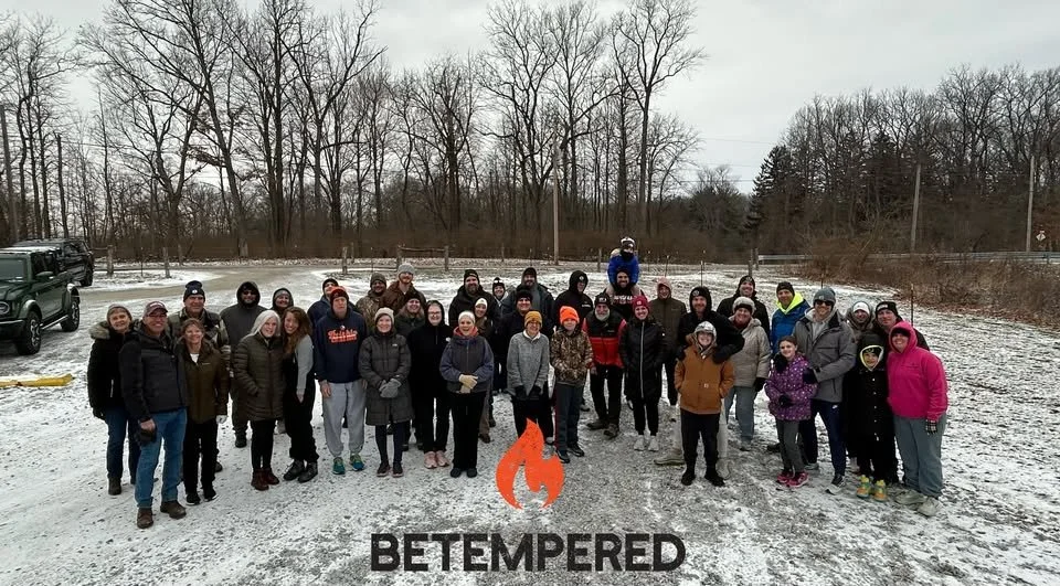 Group of hikers gathered for a winter gratitude hike.