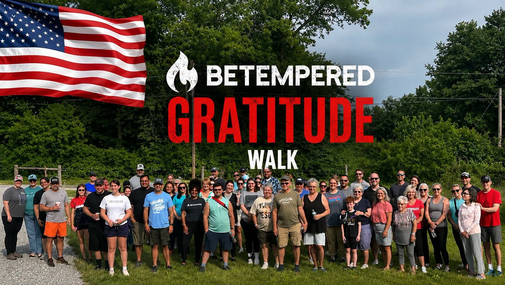 Group of people in a parking lot gathered for a photo with "BeTempered" logo.