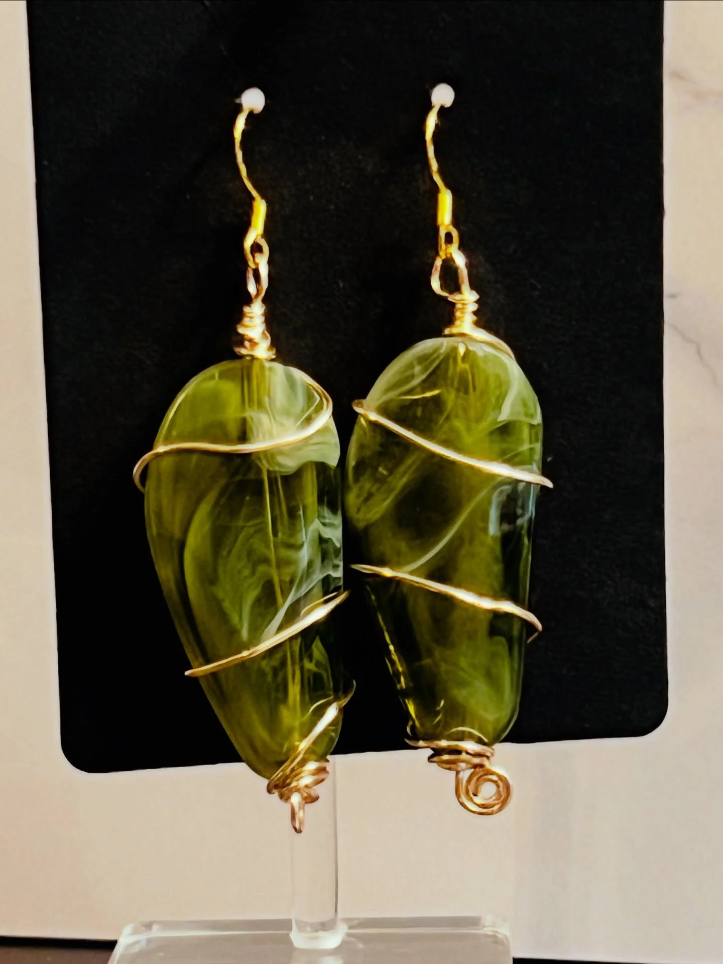 Inspired by boldness.
Introduced at the moment the world was first meeting Elphaba.

One of my favorite designs&mdash;now sold. 

Who was your favorite in the movie Wicked?

#JJSDesigns
#BeautifullyBadass
#AdornmentWithIntention
#HandmadeJewelry #Lim