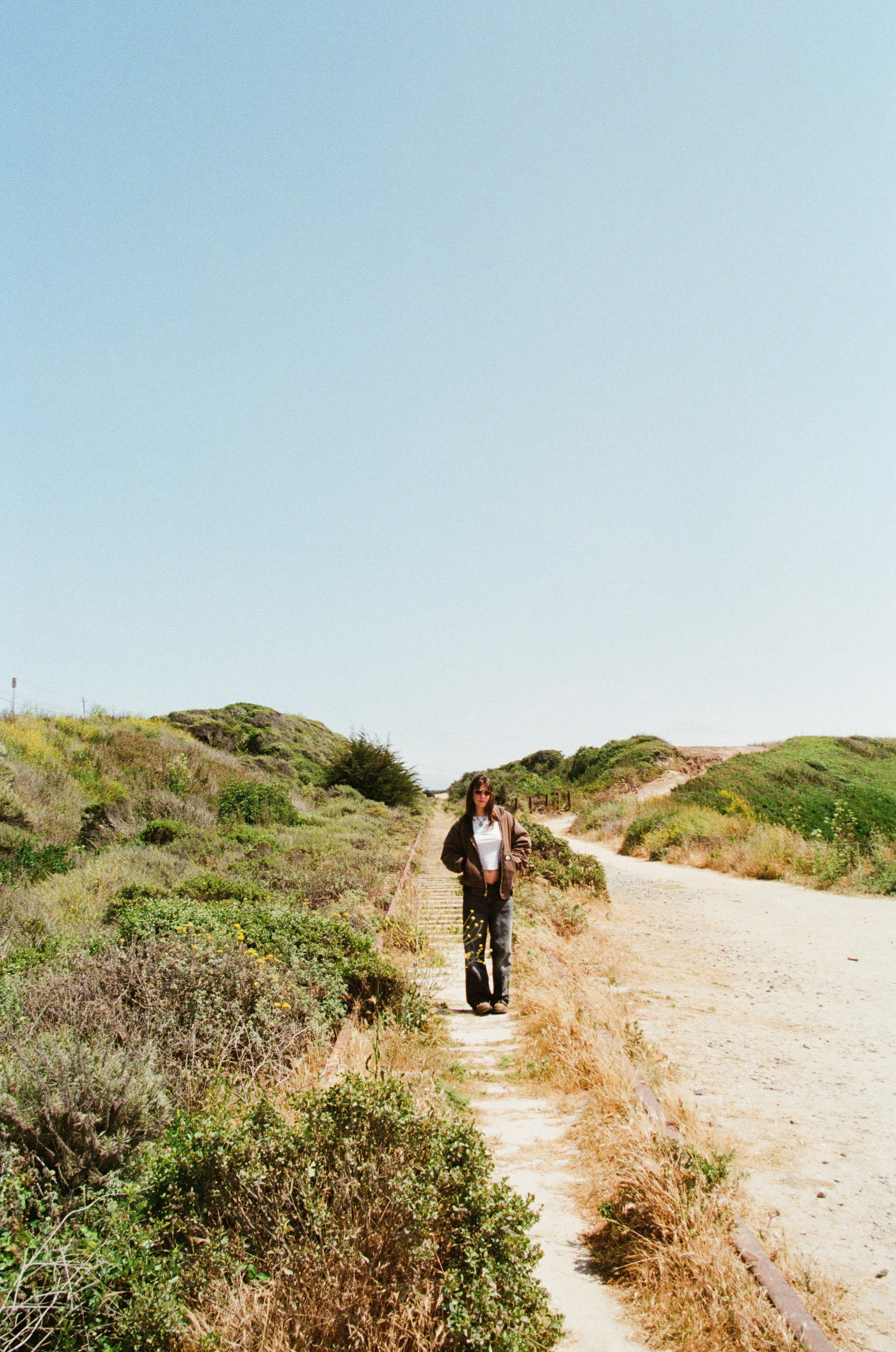 Georgia on the tracks that run next to Shark Fin Cove.