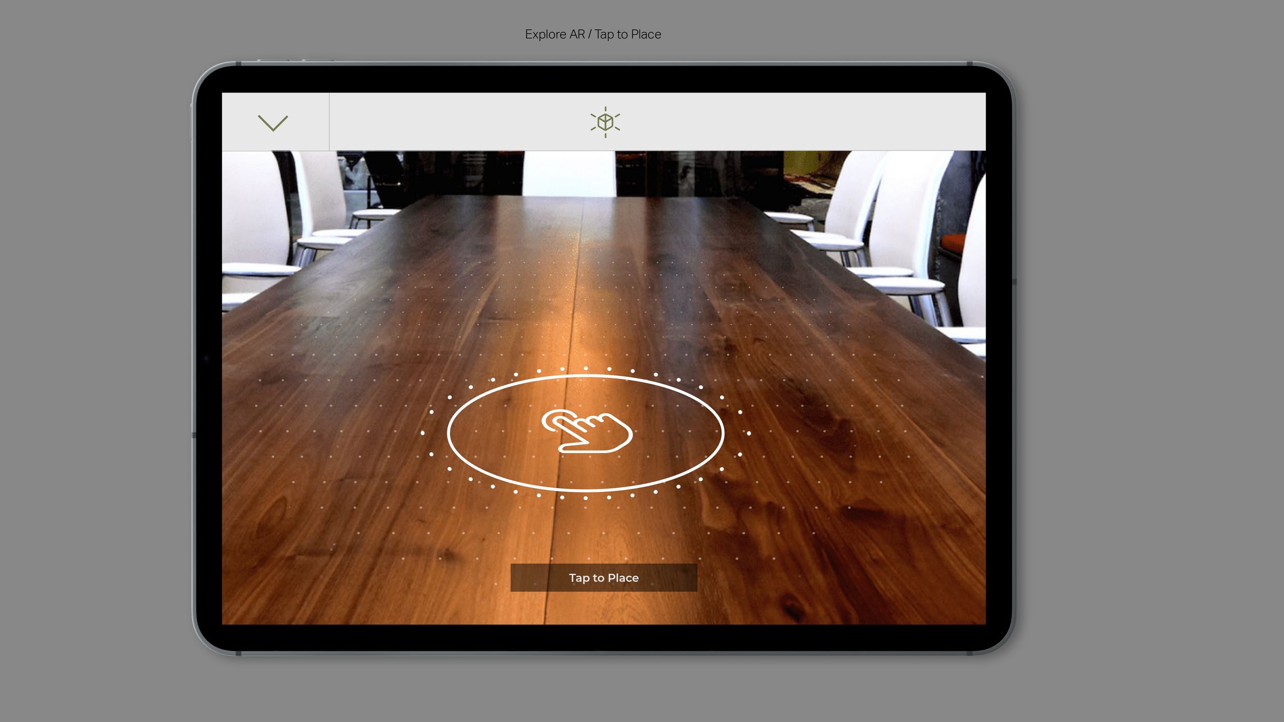 A tablet screen displaying an AR app interface over a wooden conference table, with white chairs around it.