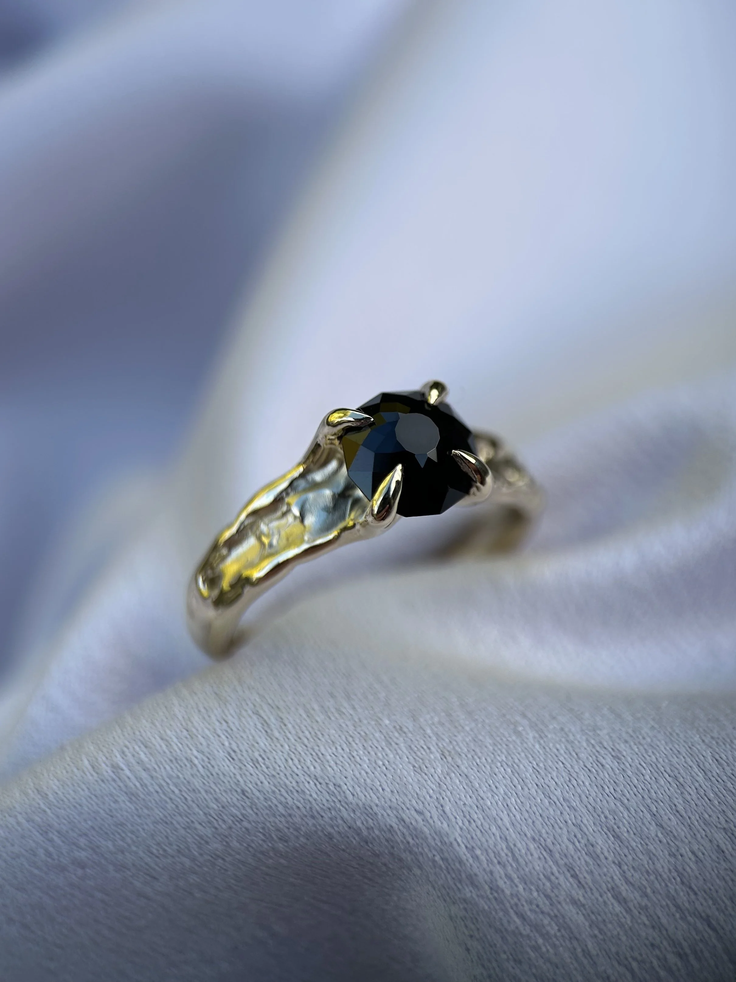 tasmanian black spinel & solid 9ct yellow gold