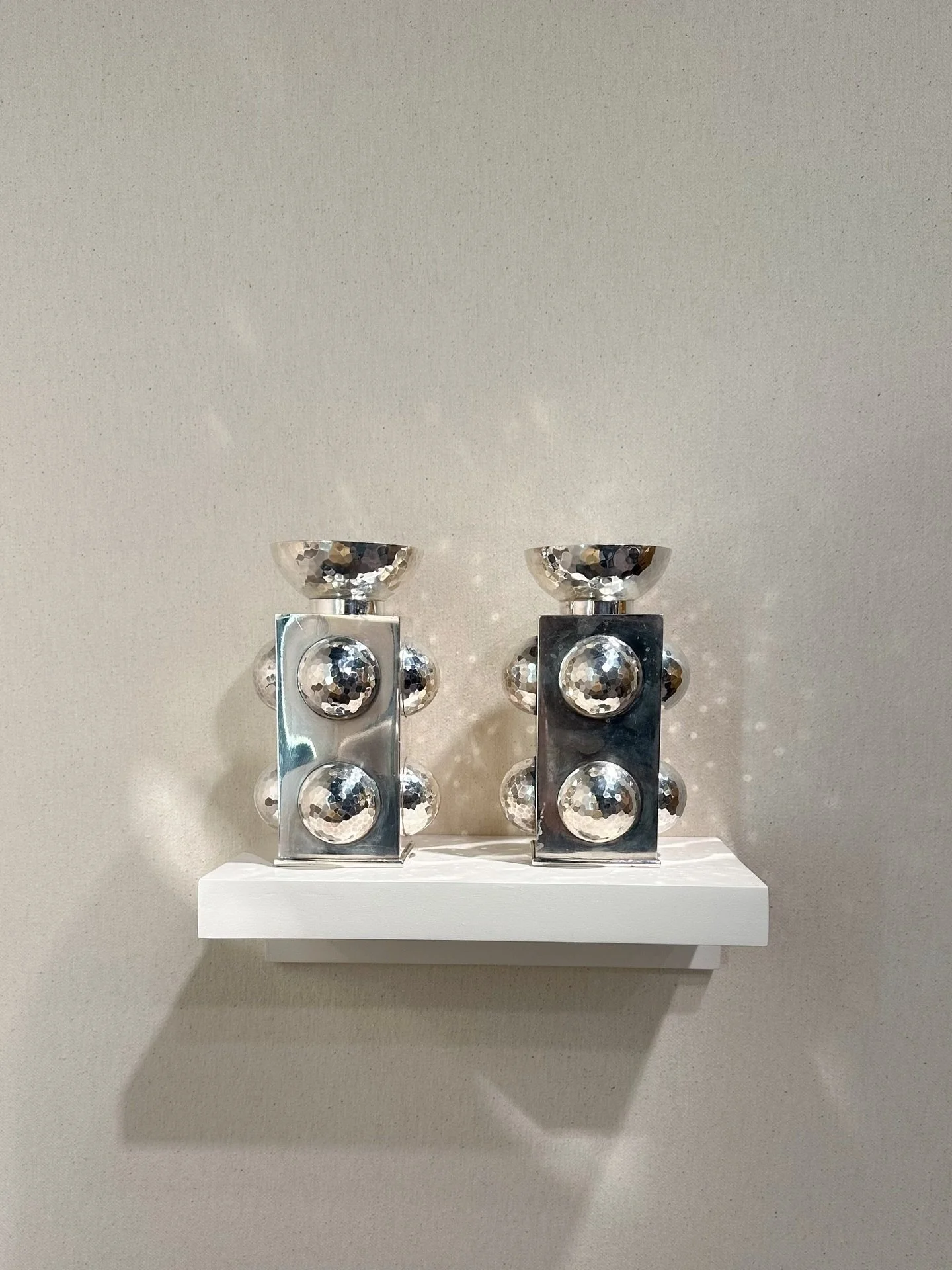 Coveted by Inga - Jean Despr&eacute;s candle holders. 

Metals have always captivated me&mdash;their duality of strength and hardness, contrasted with glamour, texture, and luminous reflection. They catch light, add dimension, and infuse a quiet kind