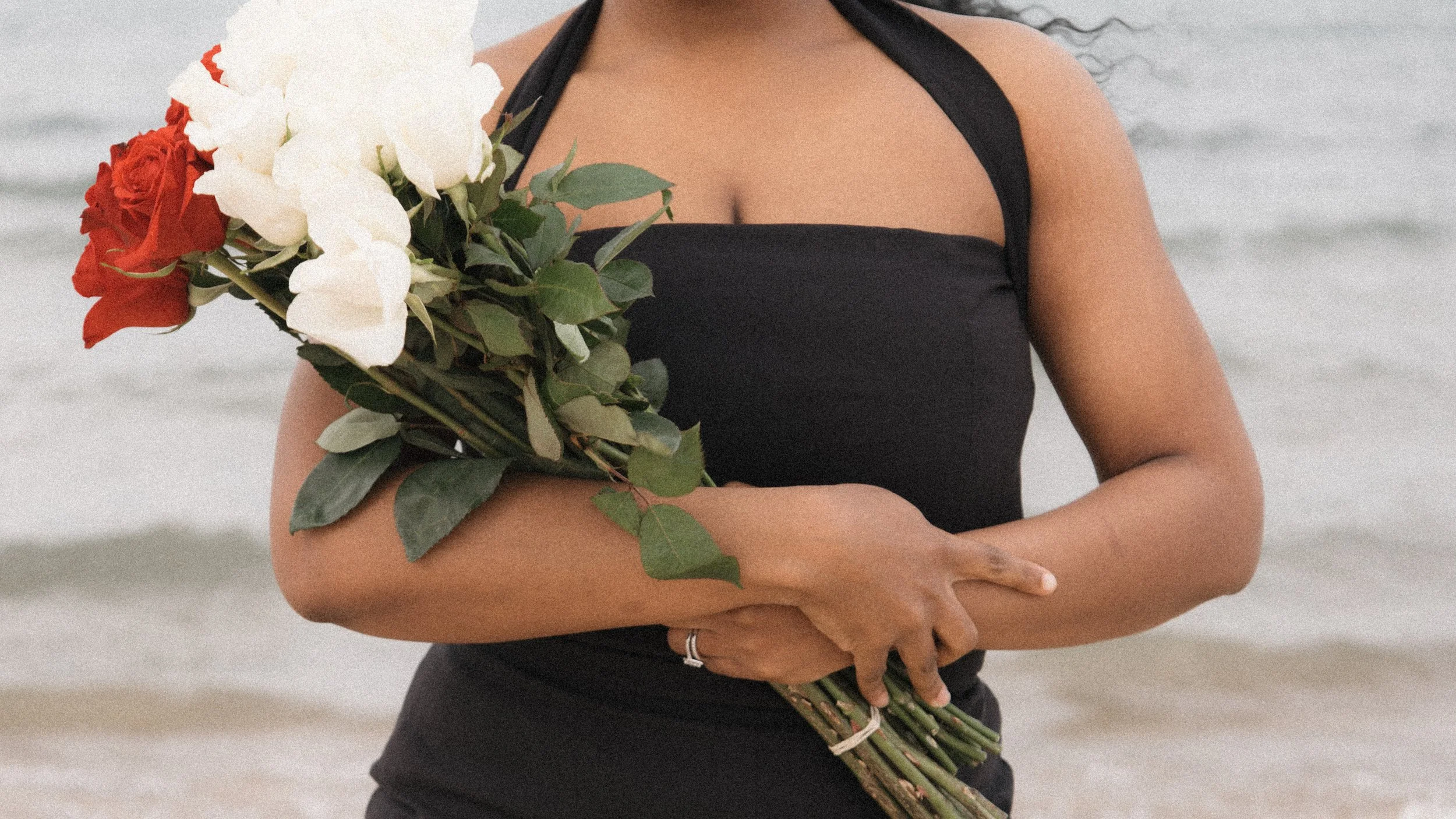 Under Black, She Bloomed...