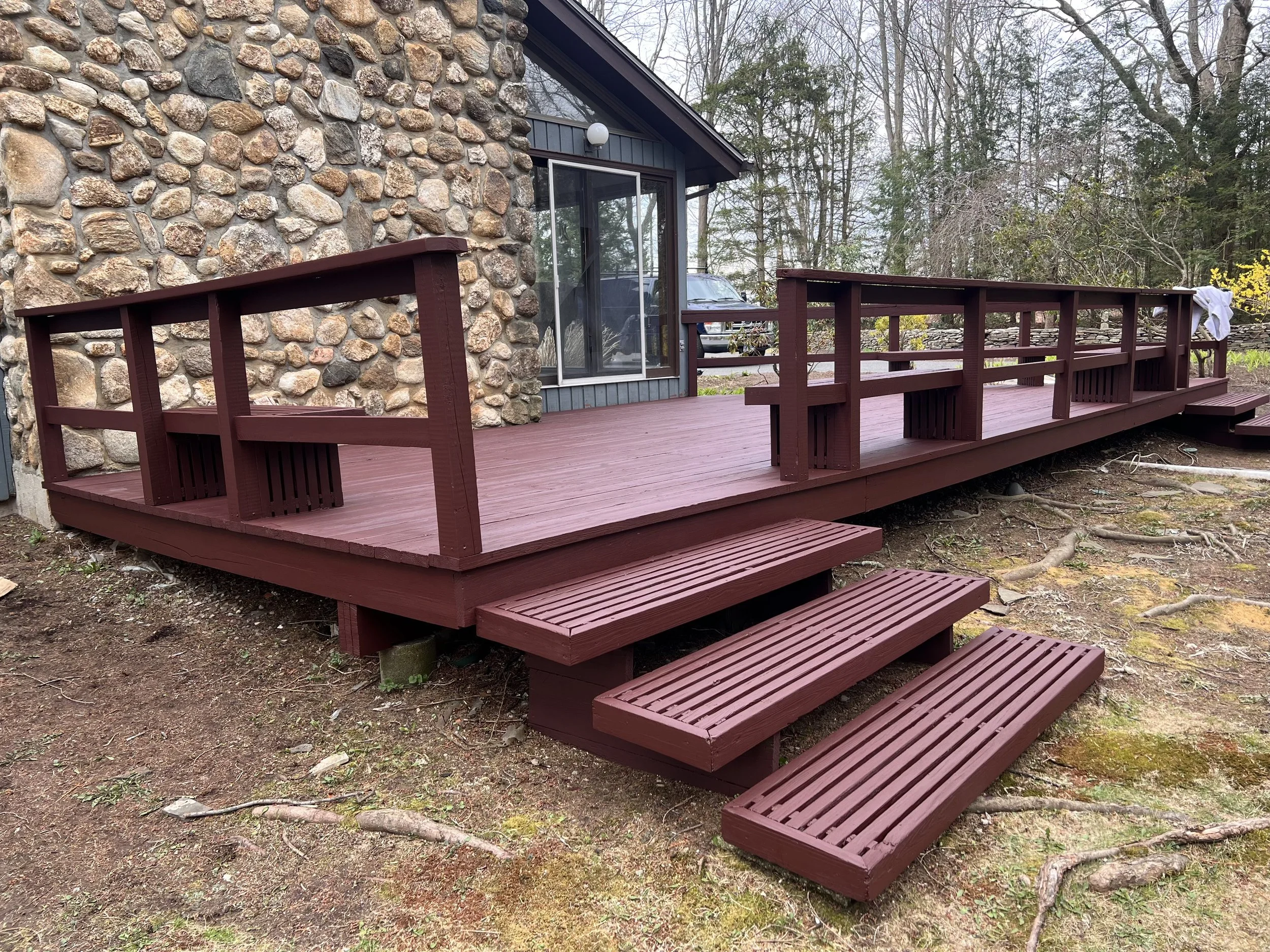 Wood outdoor deck painted red