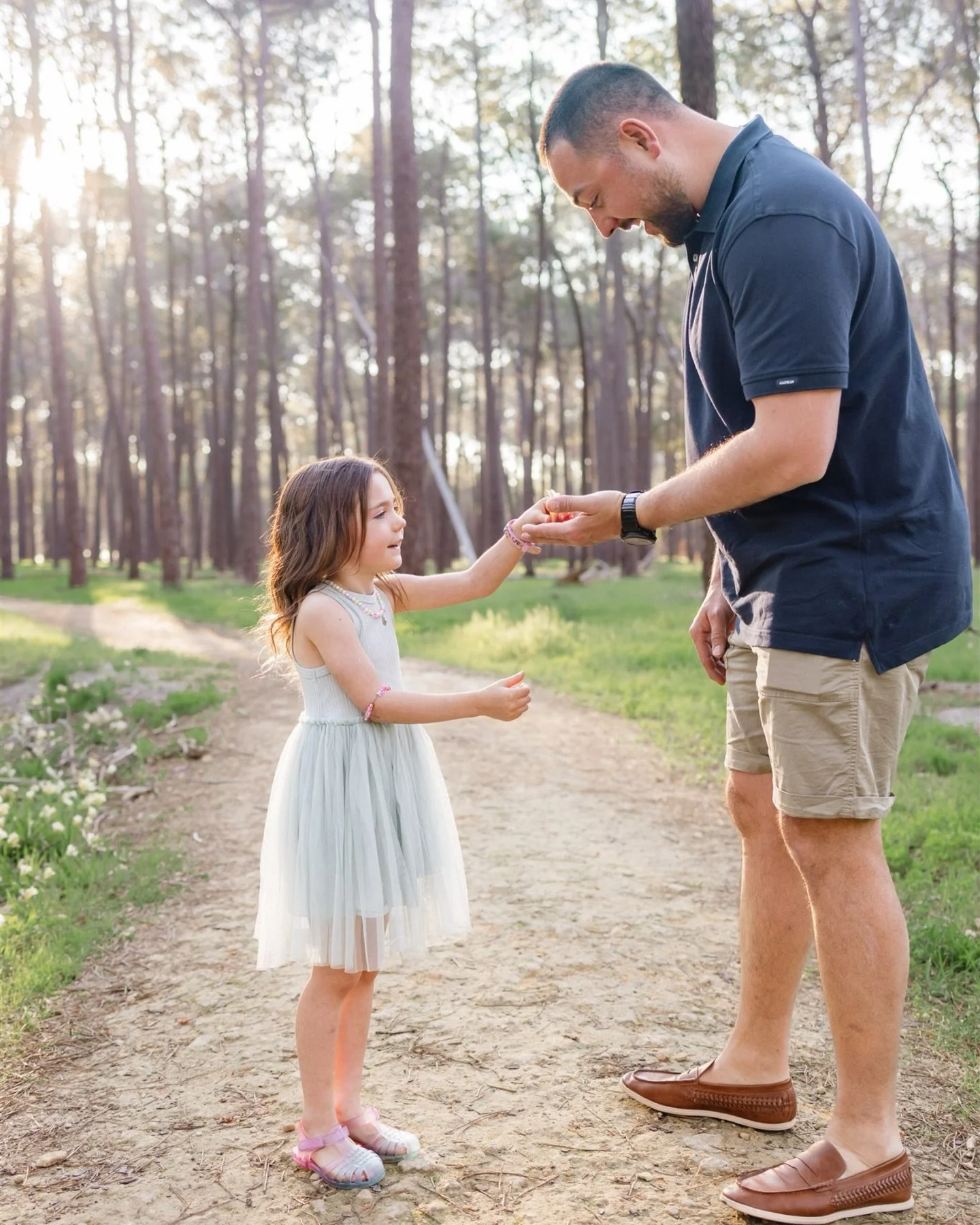 A beautiful afternoon spent in the pines, capturing the love and excitement of this family of four before they become five.

I&rsquo;m still swooning over this light! Which image is your favorite? I&rsquo;m stuck between the sisters on the log and th