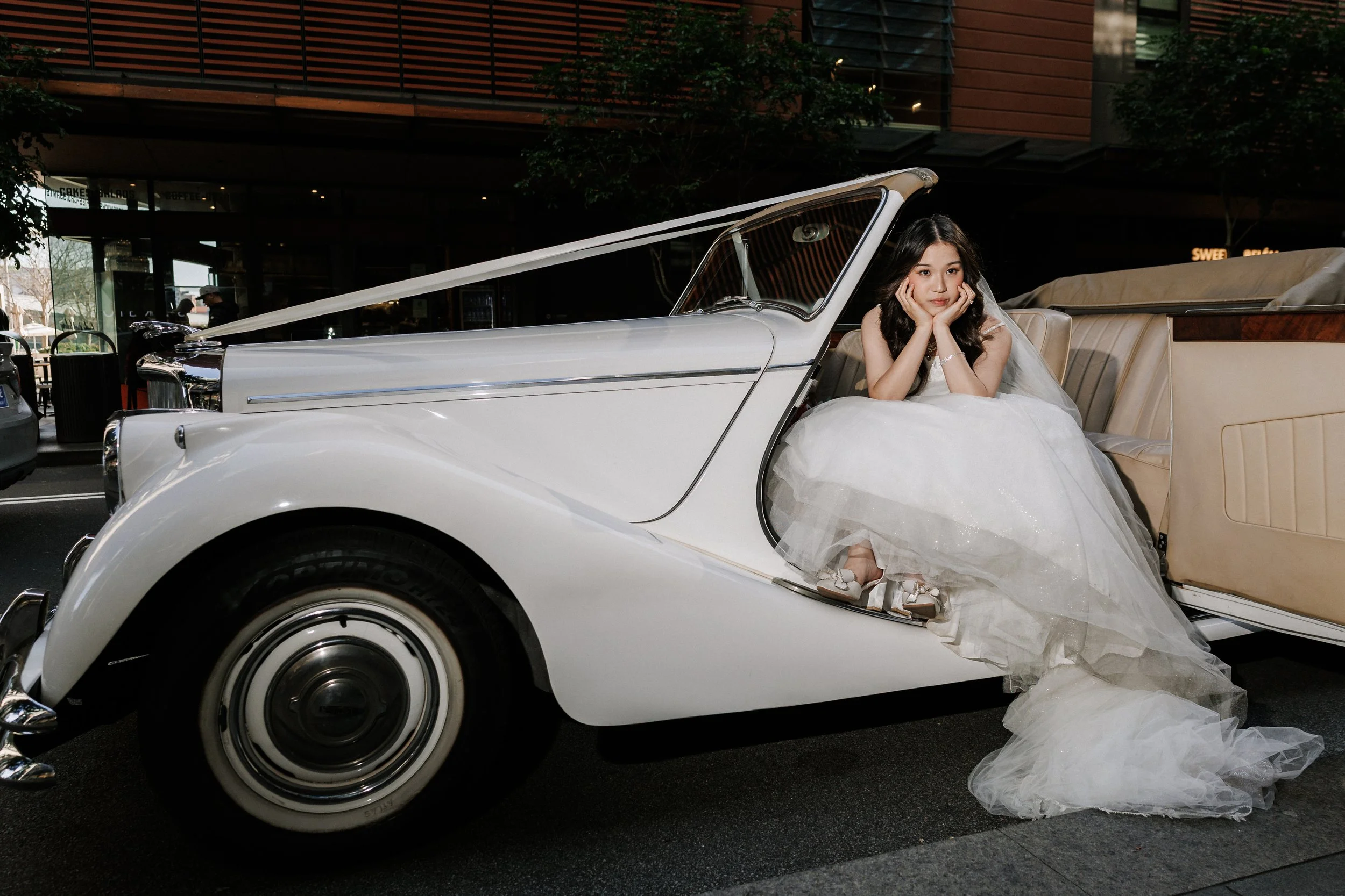 Bride in Wedding Convertible.jpg