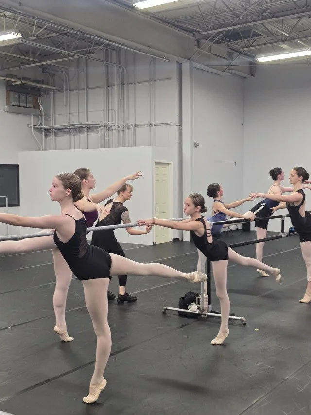 Maddy Werner teaching BalletCorps students at the barre