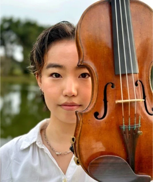 BalletCorps Resident Composer Kei Han Lee pictured with violin