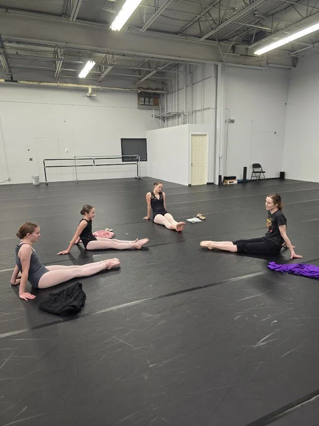 Kimberly Uphoff Spencer leading BalletCorps students through foot exercises