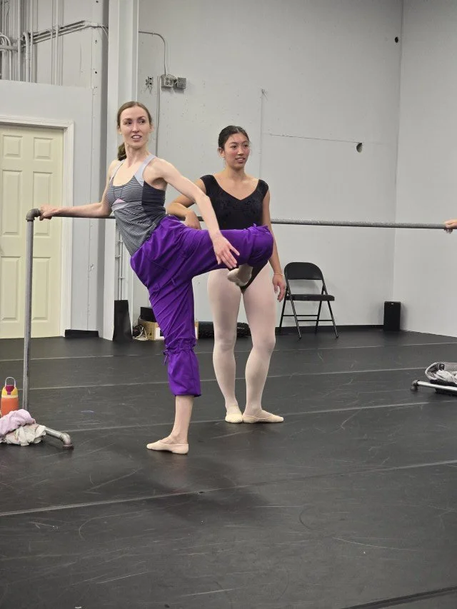 Kimberly Uphoff Spencer demonstrating attitude during a BalletCorps class
