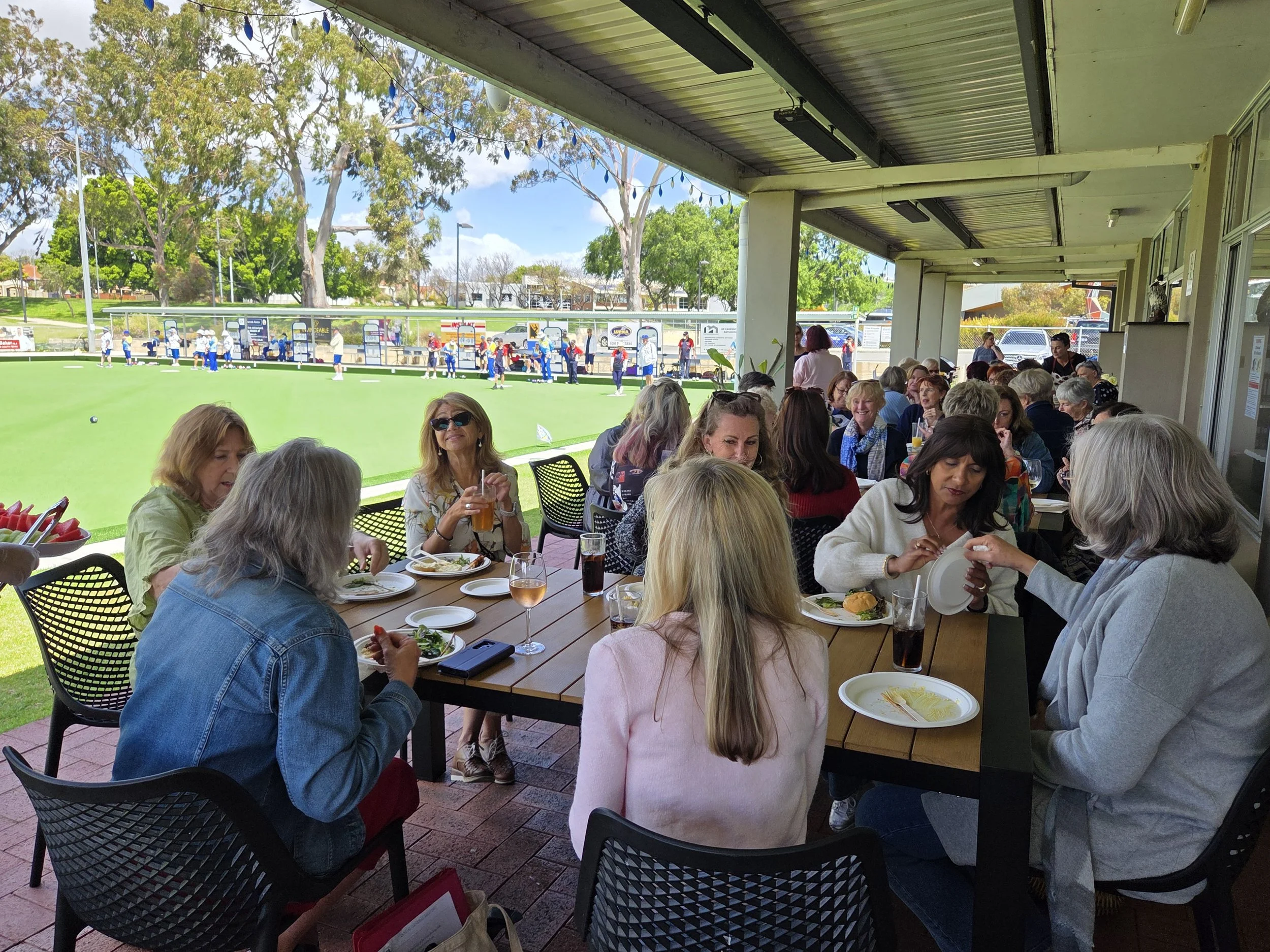 Large group of women dining outside
