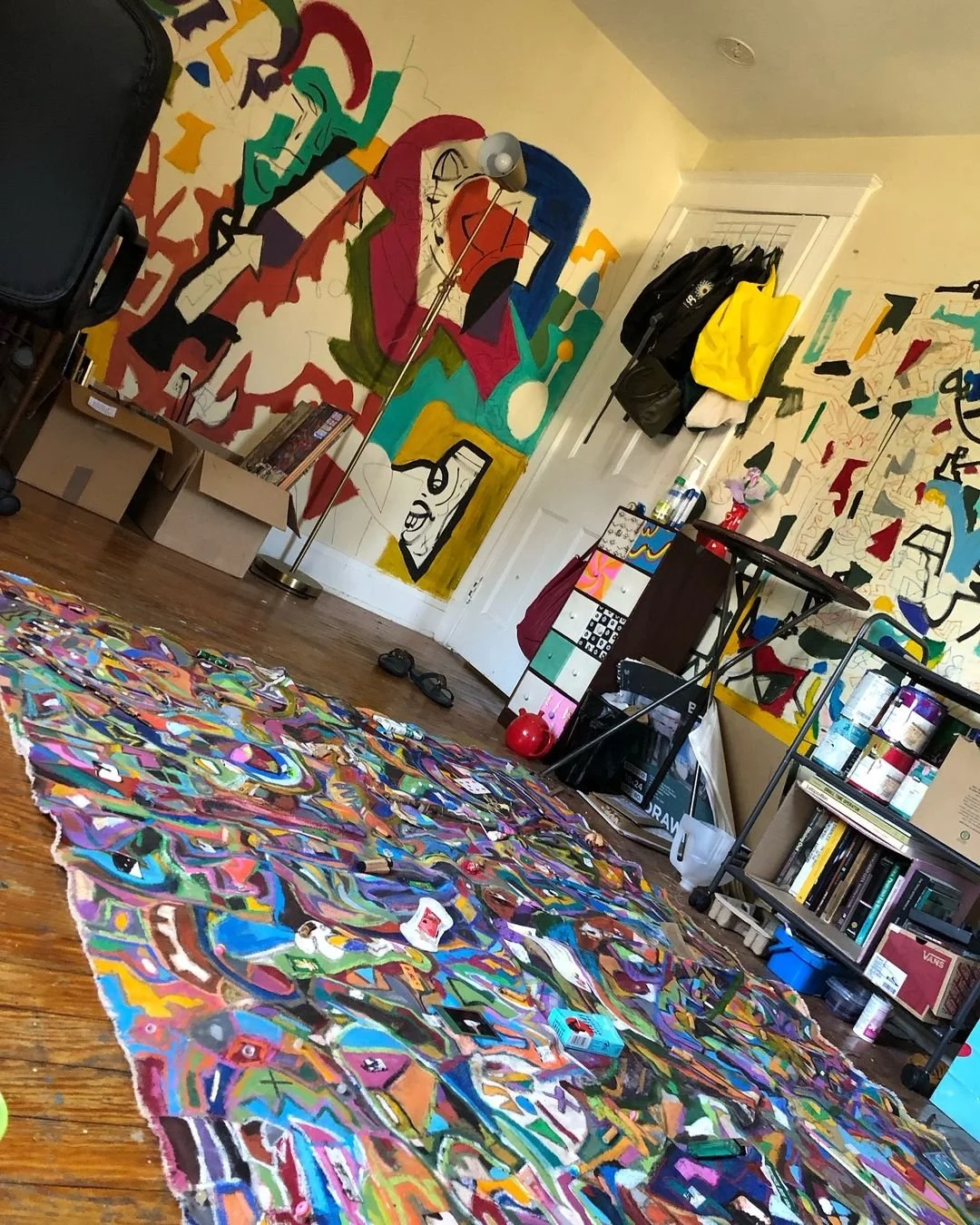 "life," Barbara Alicia Astronomo, mixed media painting, 2023. Featuring home studio mural, Waverly, Baltimore, MD.