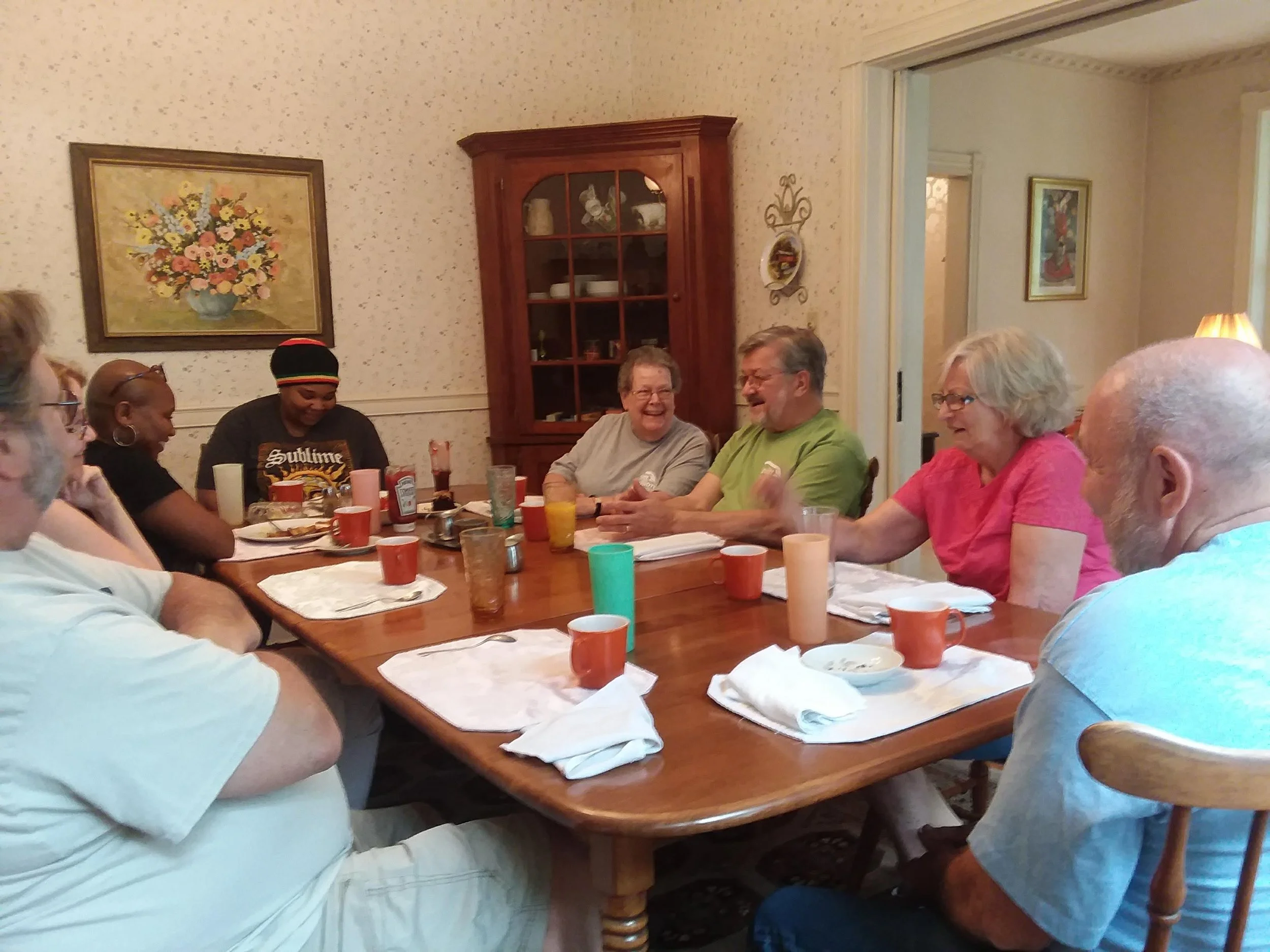 Guests enjoying breakfast in the historic dining room at Bella Vista Bed and Breakfast in Akron, Pennsylvania.