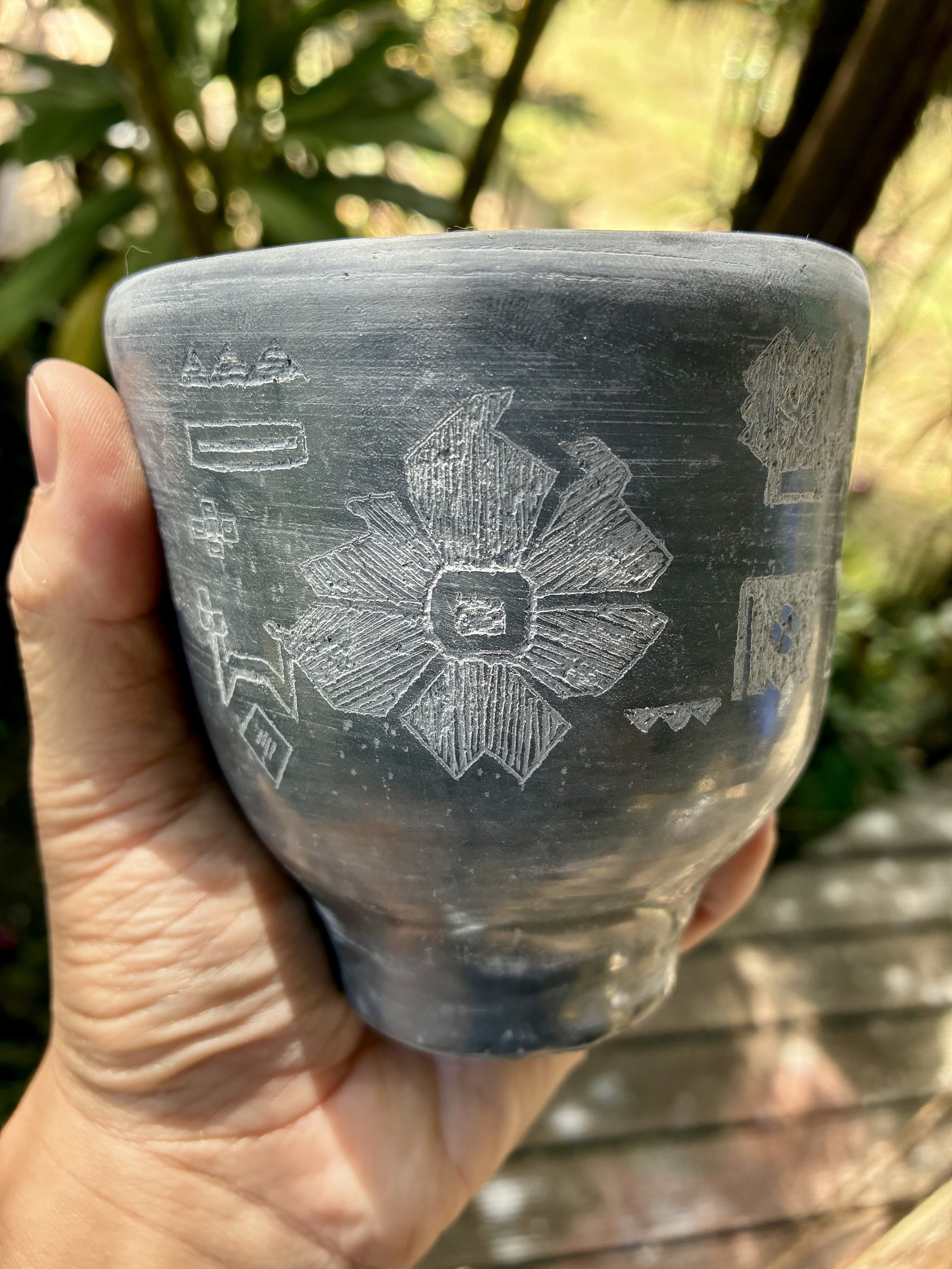 FARSI/CHINESE TEA CUP: Wen Xiang Bei (aroma cup) black clay, burnished and engraved with Qashqai rug patterns from Shiraz, my mother's birthplace (work in progress)
