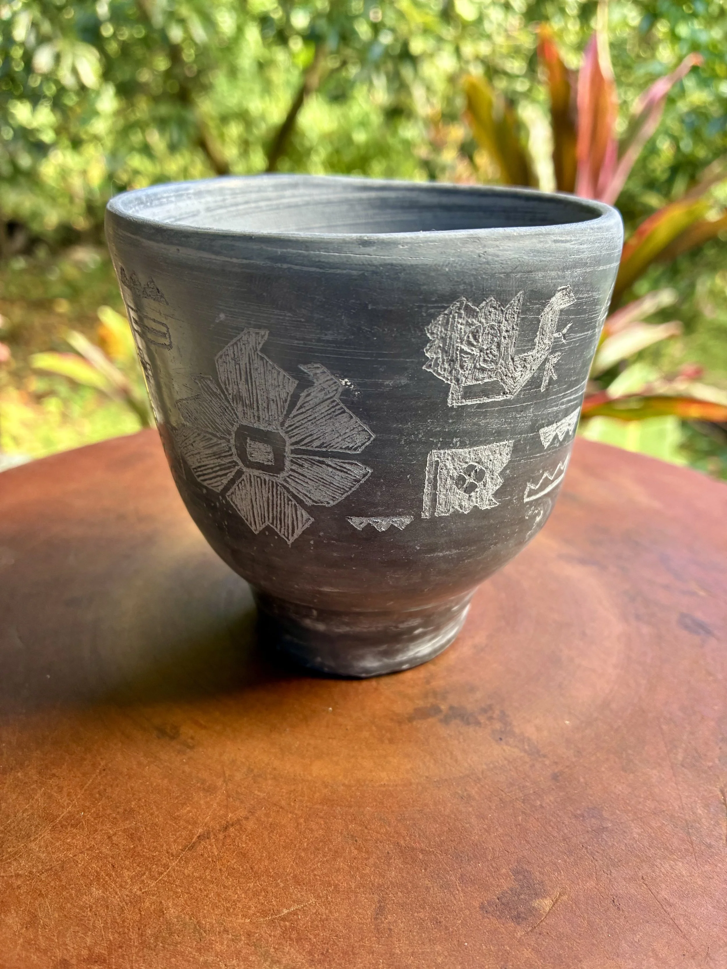 Wen Xiang Bei (aroma cup) black clay, burnished and engraved with Qashqai rug patterns from Shiraz, my mother's birthplace (work in progress)