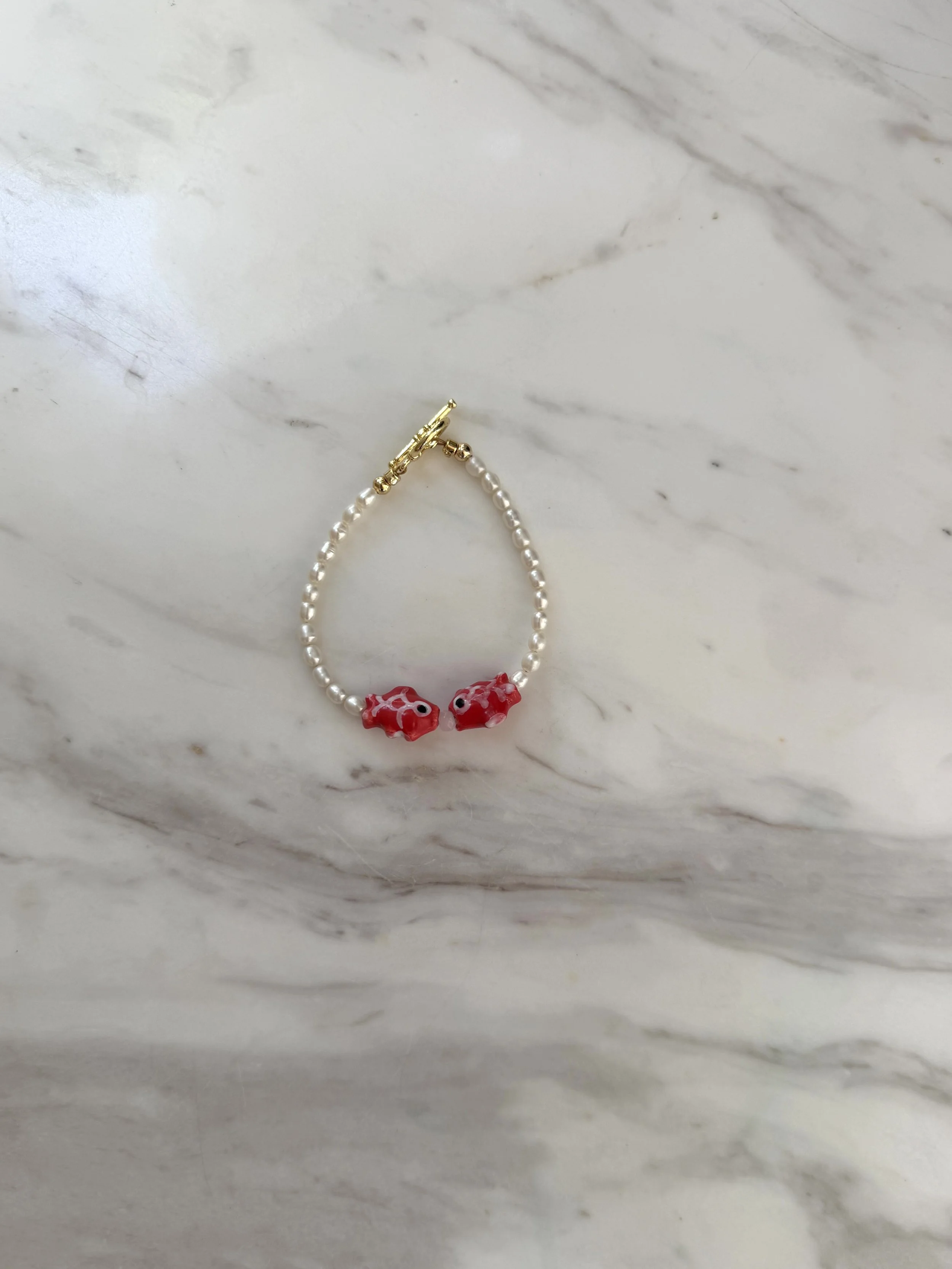 fishy pearl bracelet red.jpg