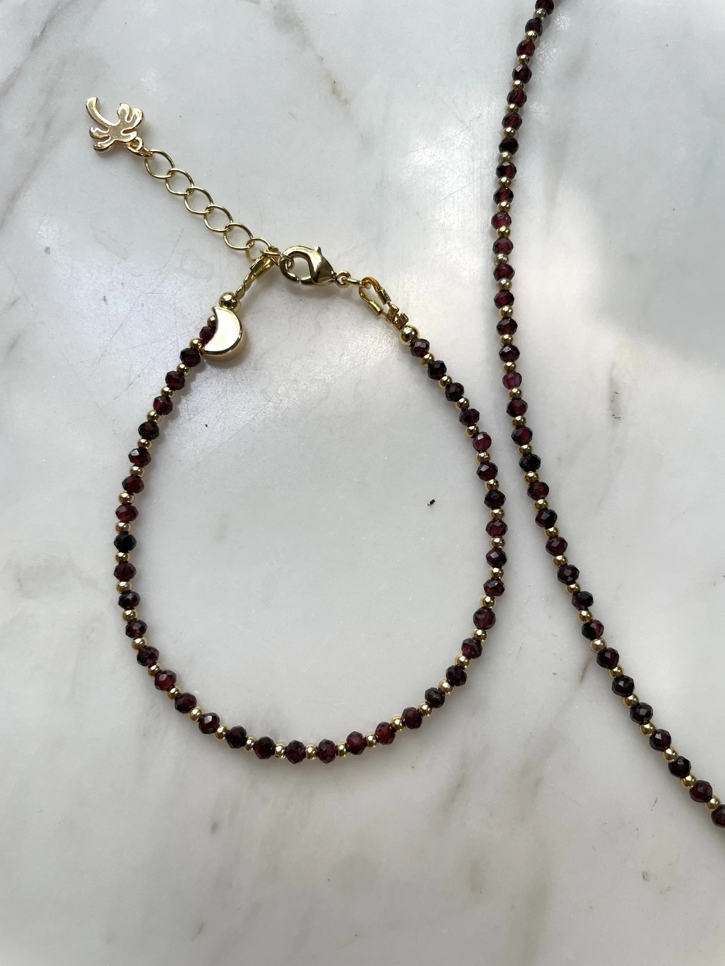 garnet jan birthstone bracelet with charm.jpg