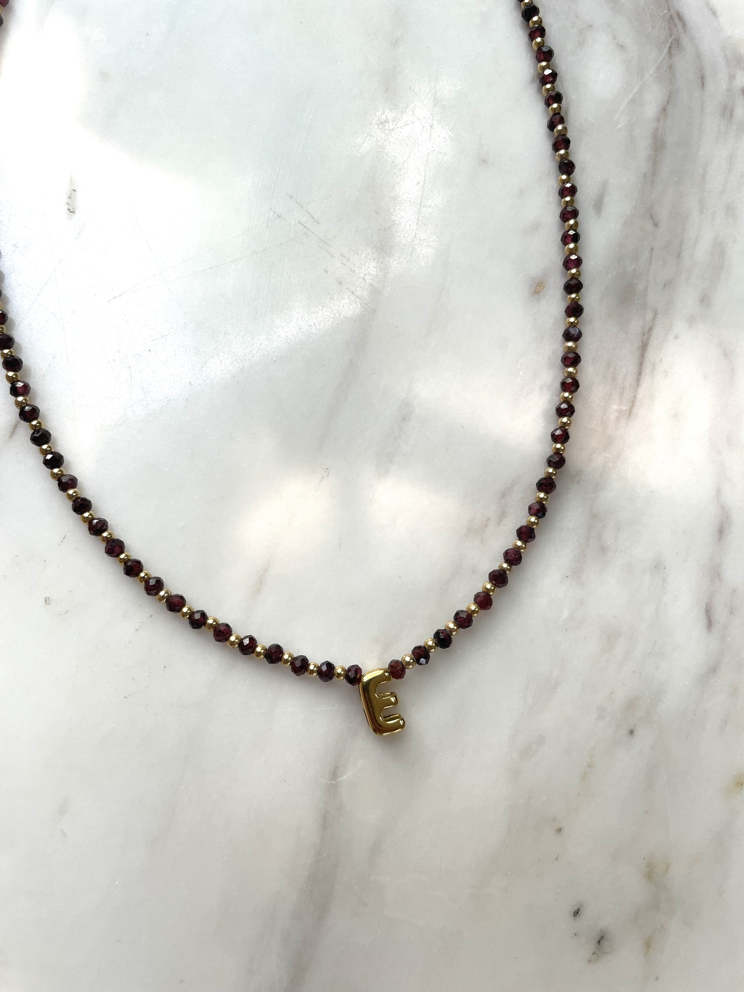 garnet jan birthstone initial necklace.jpg