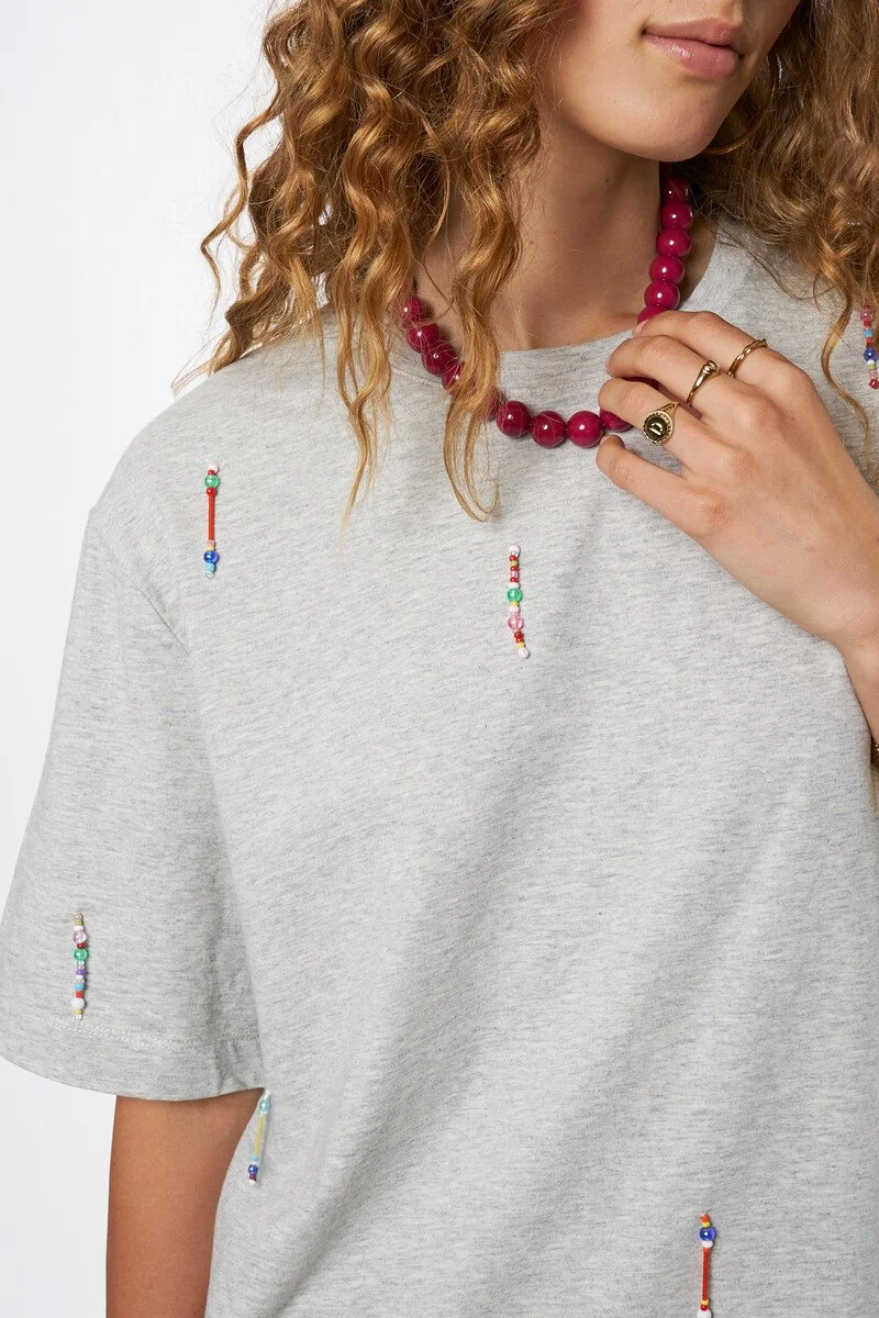 product_images-light_grey_t-shirt_with_colourful_beaded_fringes_closeup_1.jpeg
