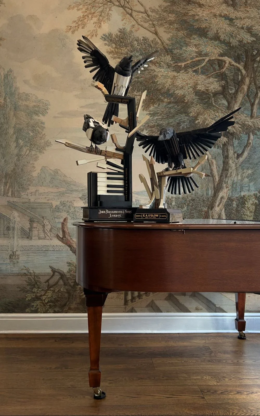 Two Magpies sculpture with Crow sculpture.