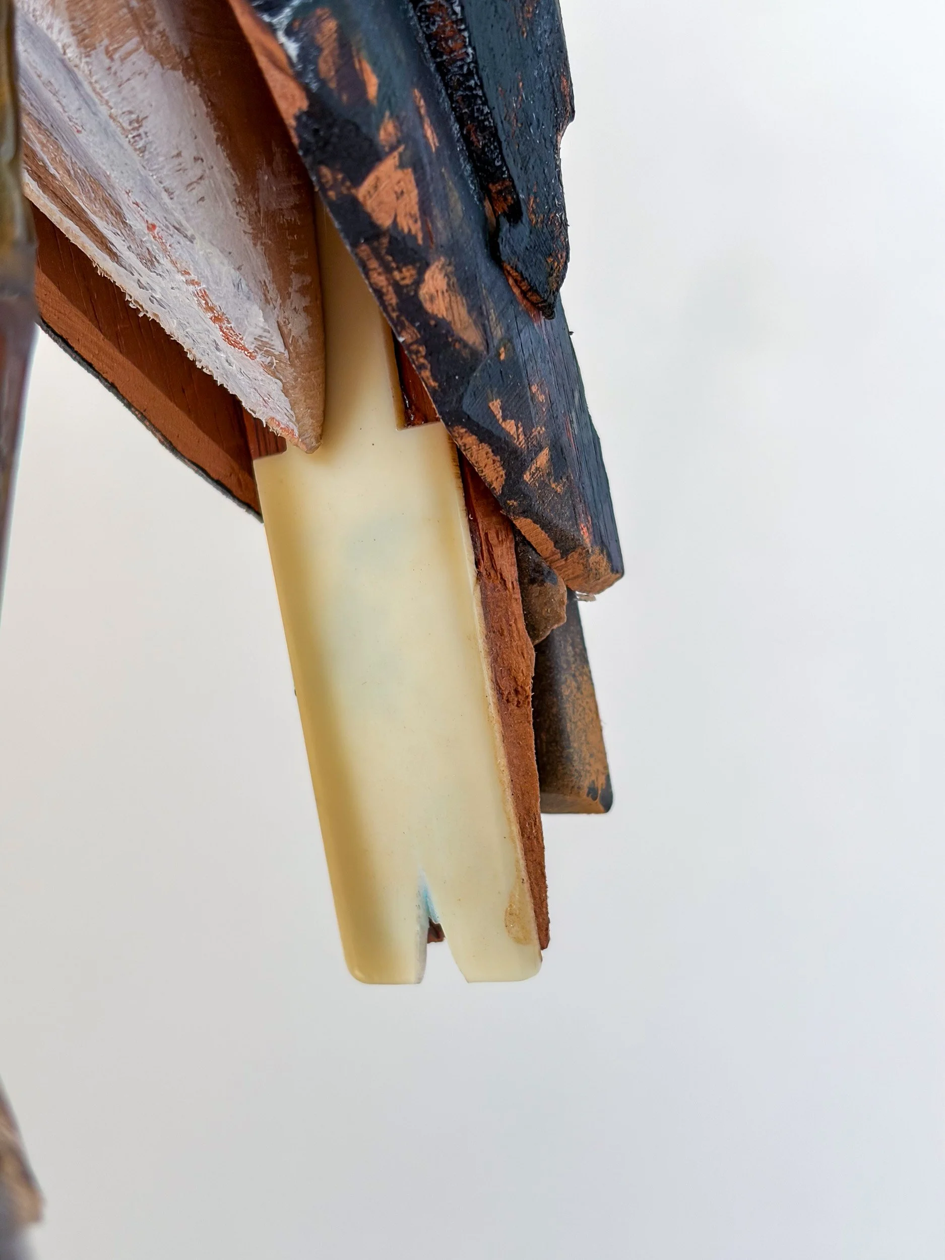 Northern Lapwing sculpture made from piano parts, with tail detail.