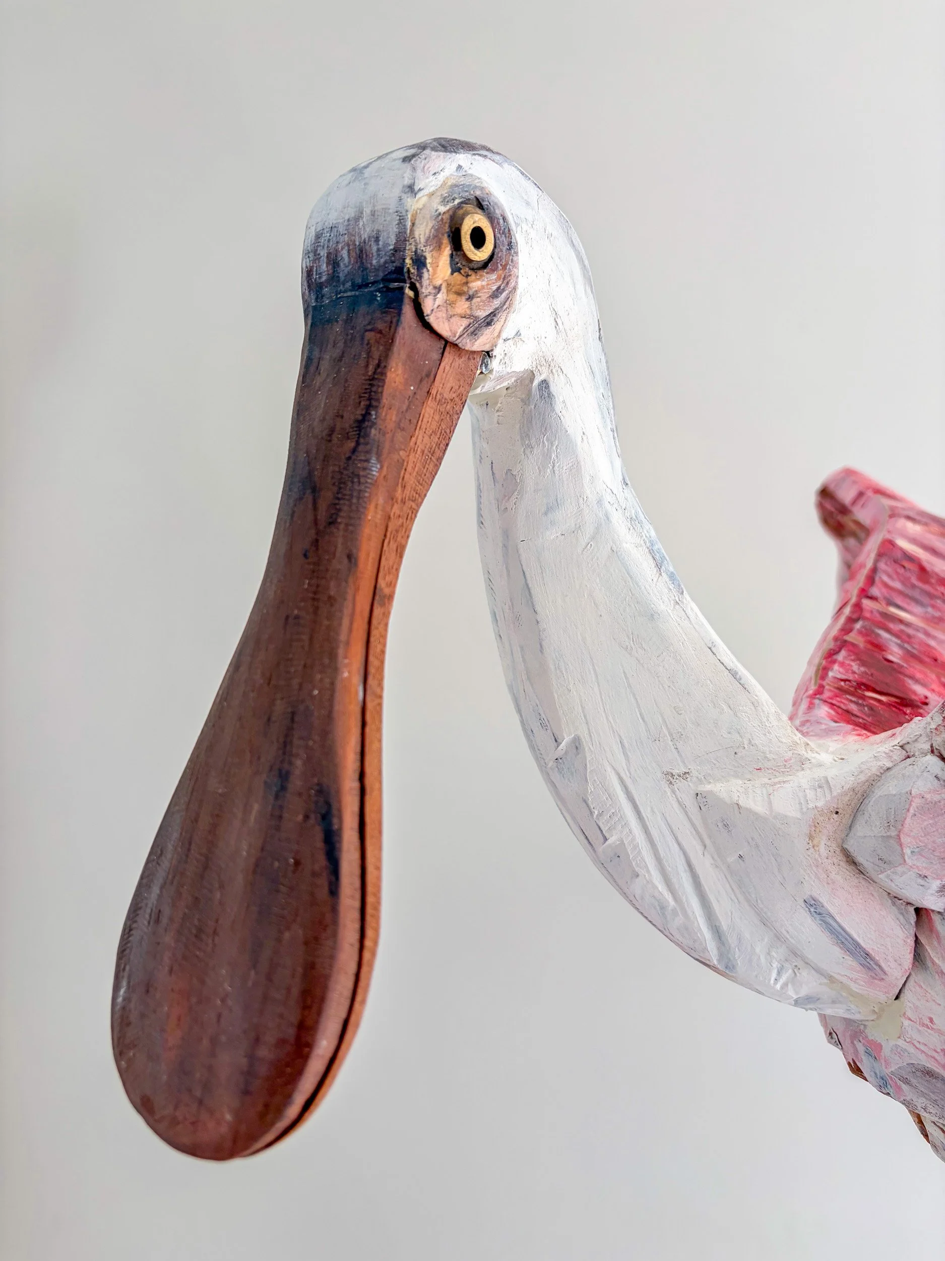 Roseate Spoonbill sculpture made from piano parts close up of beak made from pedal.
