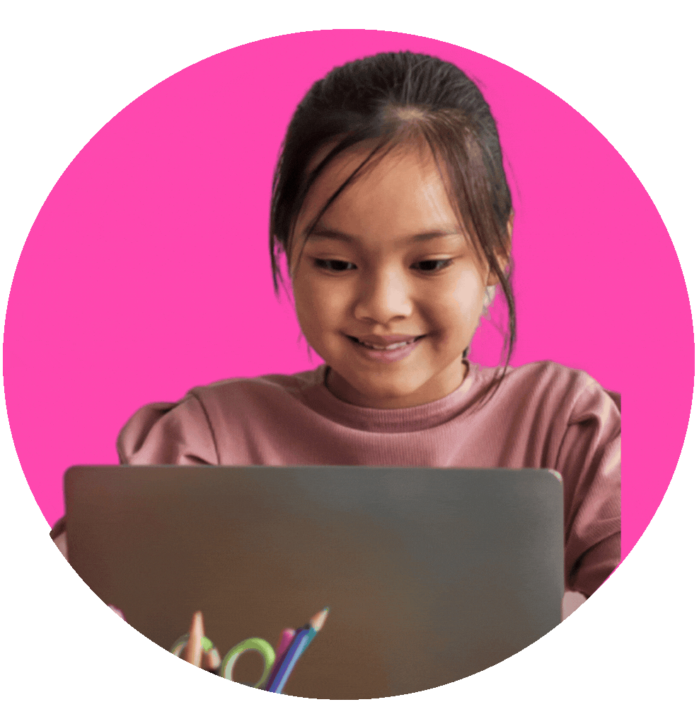 A young girl with dark hair in a ponytail is smiling and looking at a laptop screen, with a pink background inside a circular frame.