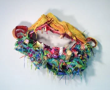 Site Bite, 24 x 15 x 4in, 2007, polystyrene, pigmented silicone, fabric
