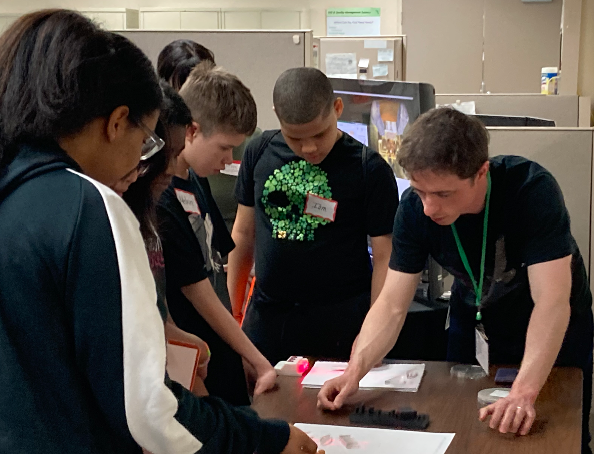 Lowell 6th graders learn about lasers at Excelitas