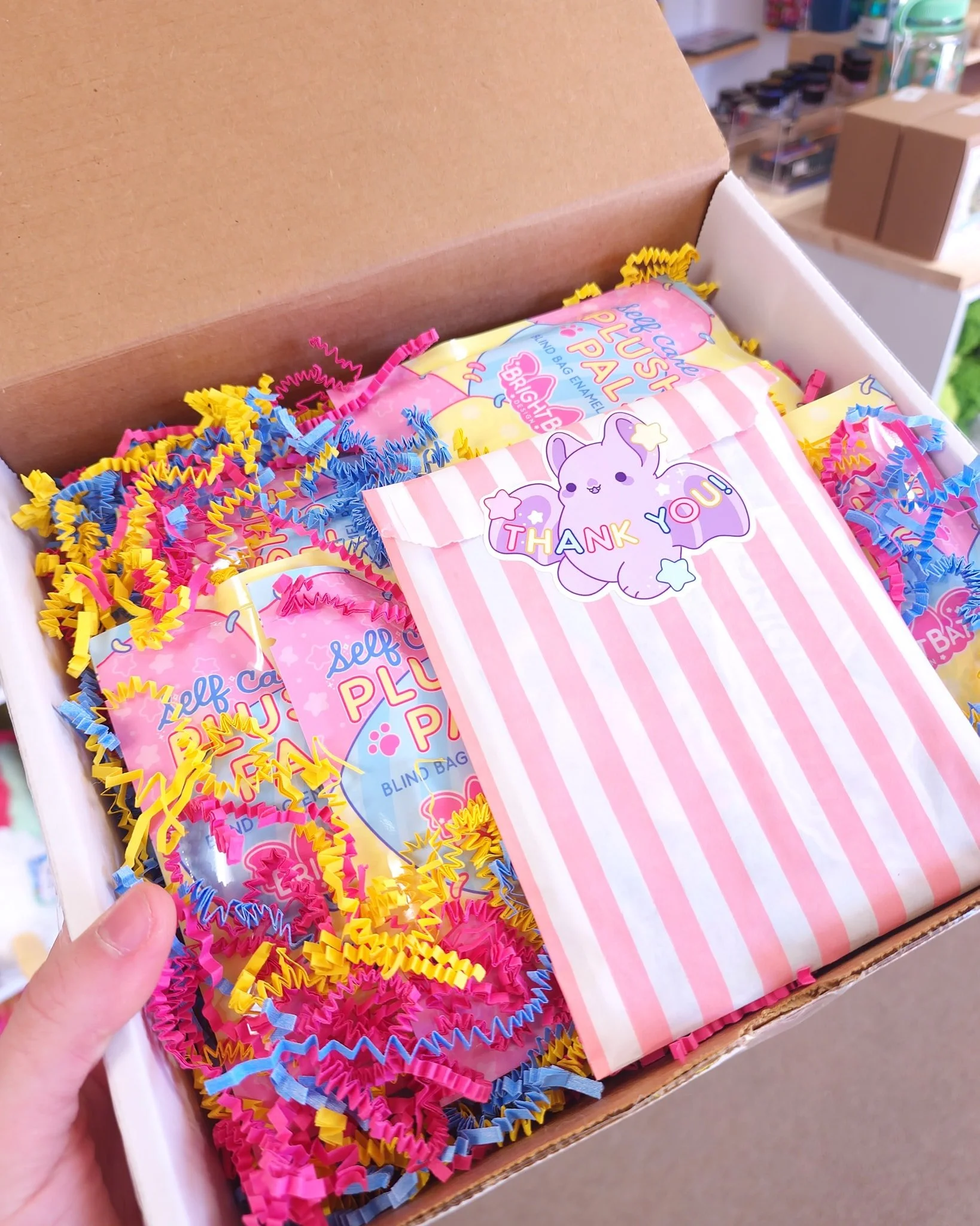 Package day is always SO exciting! Today we have some new gorgeous products from one of my favorite artists, @brightbat ! Come check out some perfect stocking stuffers- enamel pins, blind bags, and super cute magnets, all in stock today!