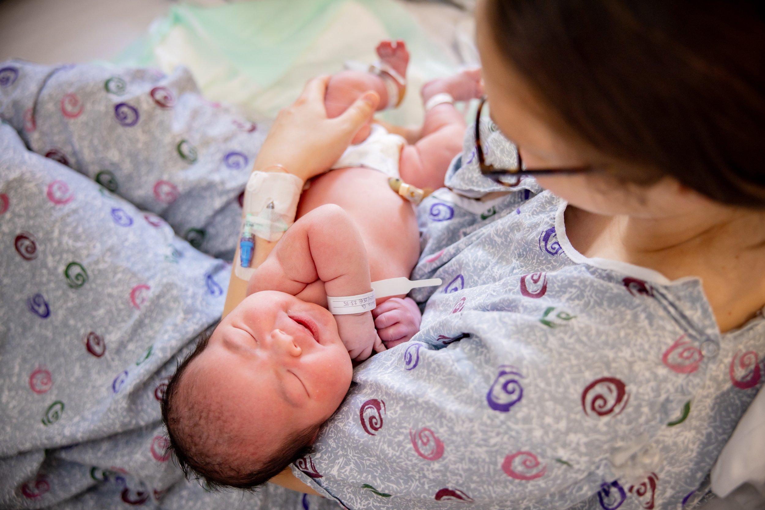 Happy newborn baby at a fresh 48 photography session at Doctor's Hospital of Augusta, GA.