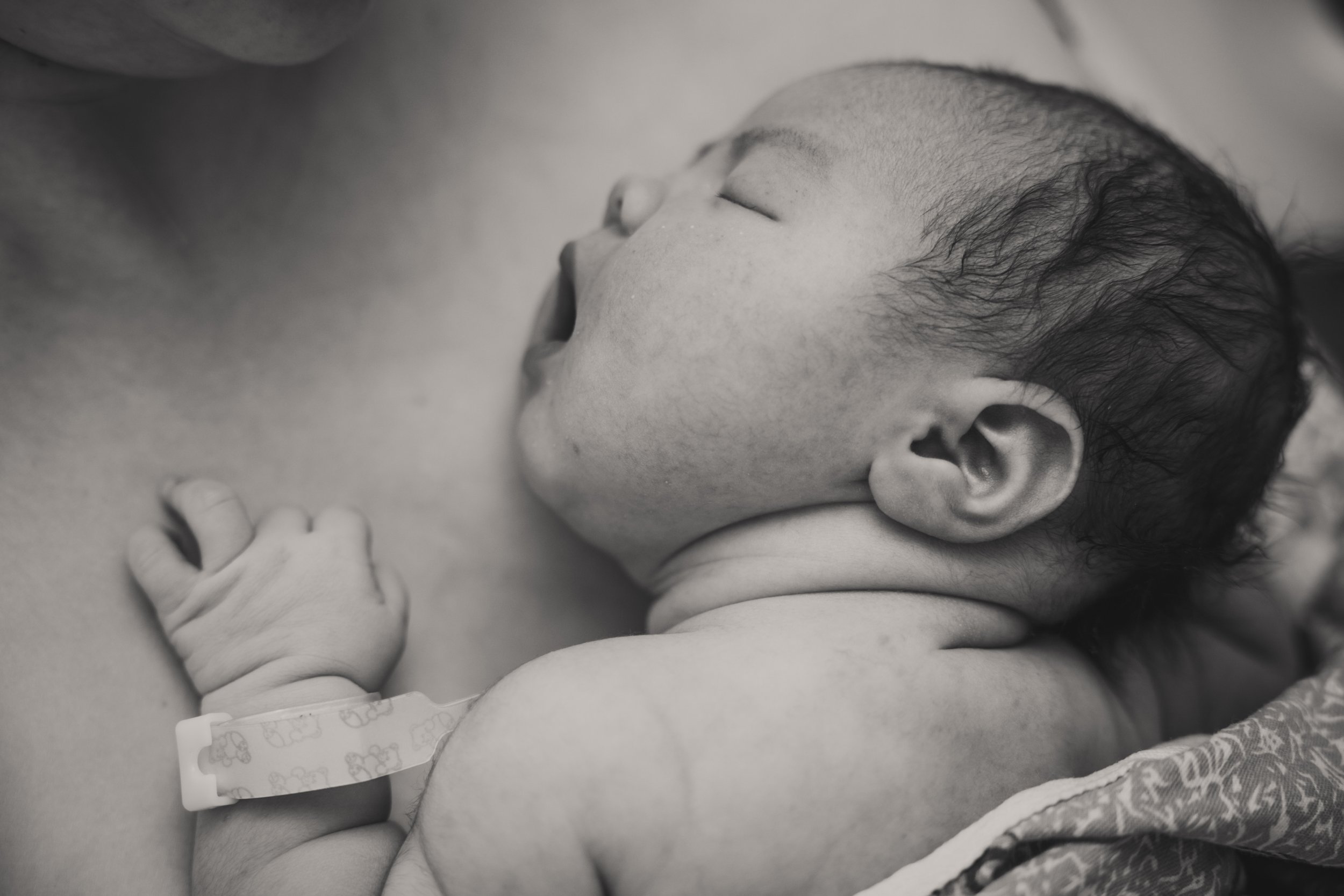 Newborn baby girl at a fresh 48 photography session at Doctor's Hospital of Augusta, GA.