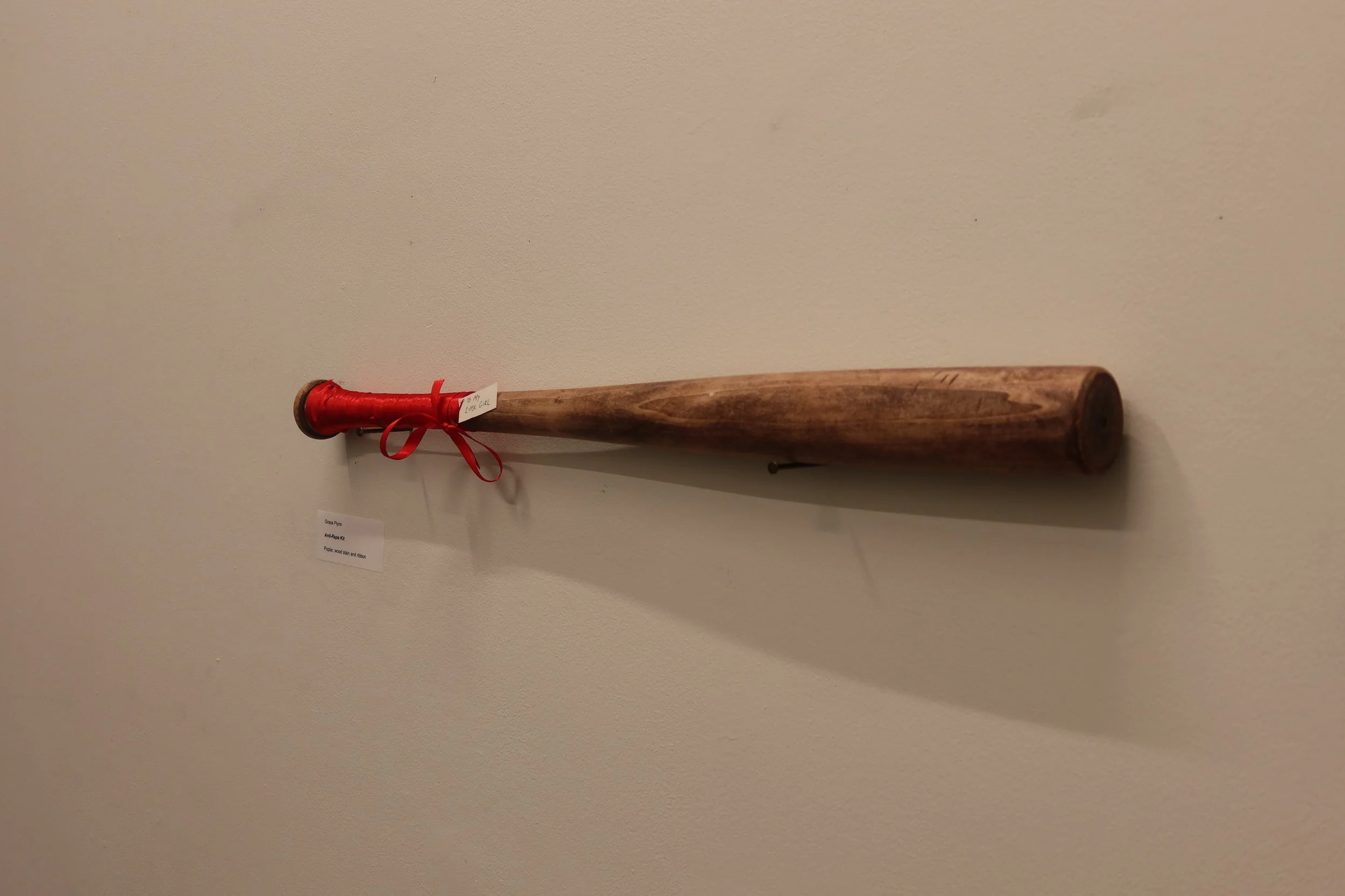 'Anti-Rape Kit', poplar, woodstain and ribbon, 30x2.5", 2024.