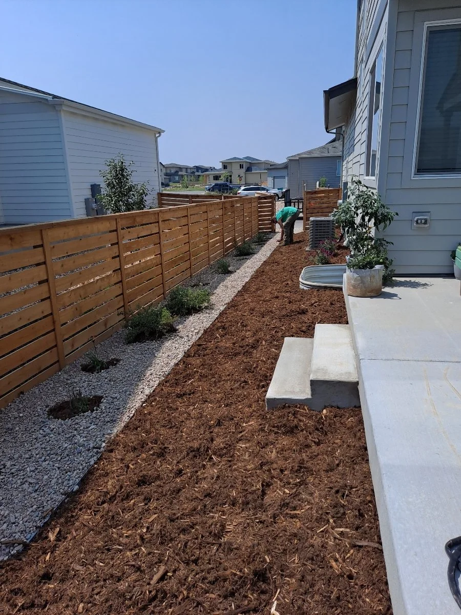 Rock replacement, addition of drip line, flowers, landscaping rock and mulch.  (Before & After)
