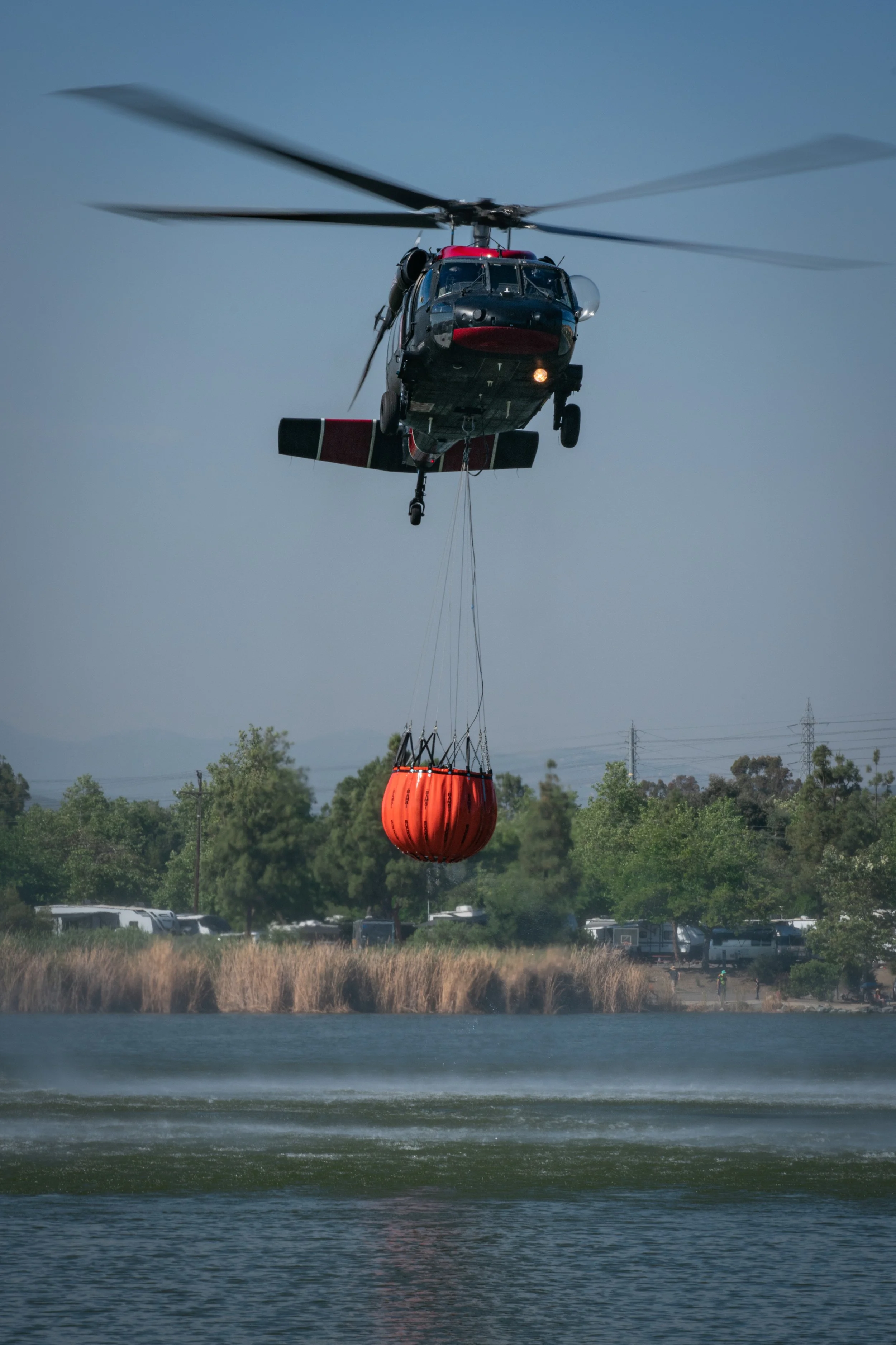 Helicopter hovering over water