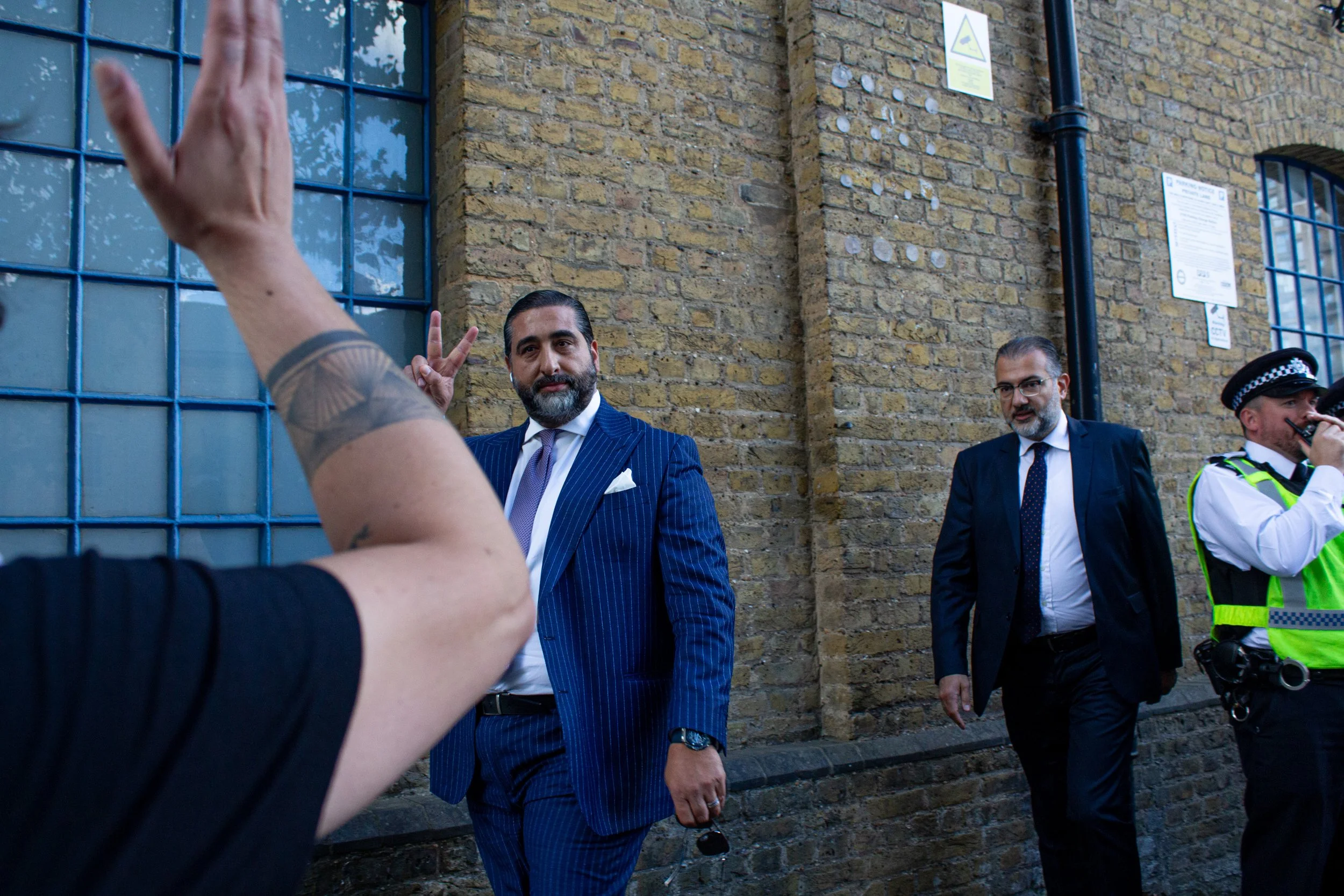Businessmen attending the DSEI Arms fari react to the anti-arms, pro-Palestine protests, 2025. (1/3)