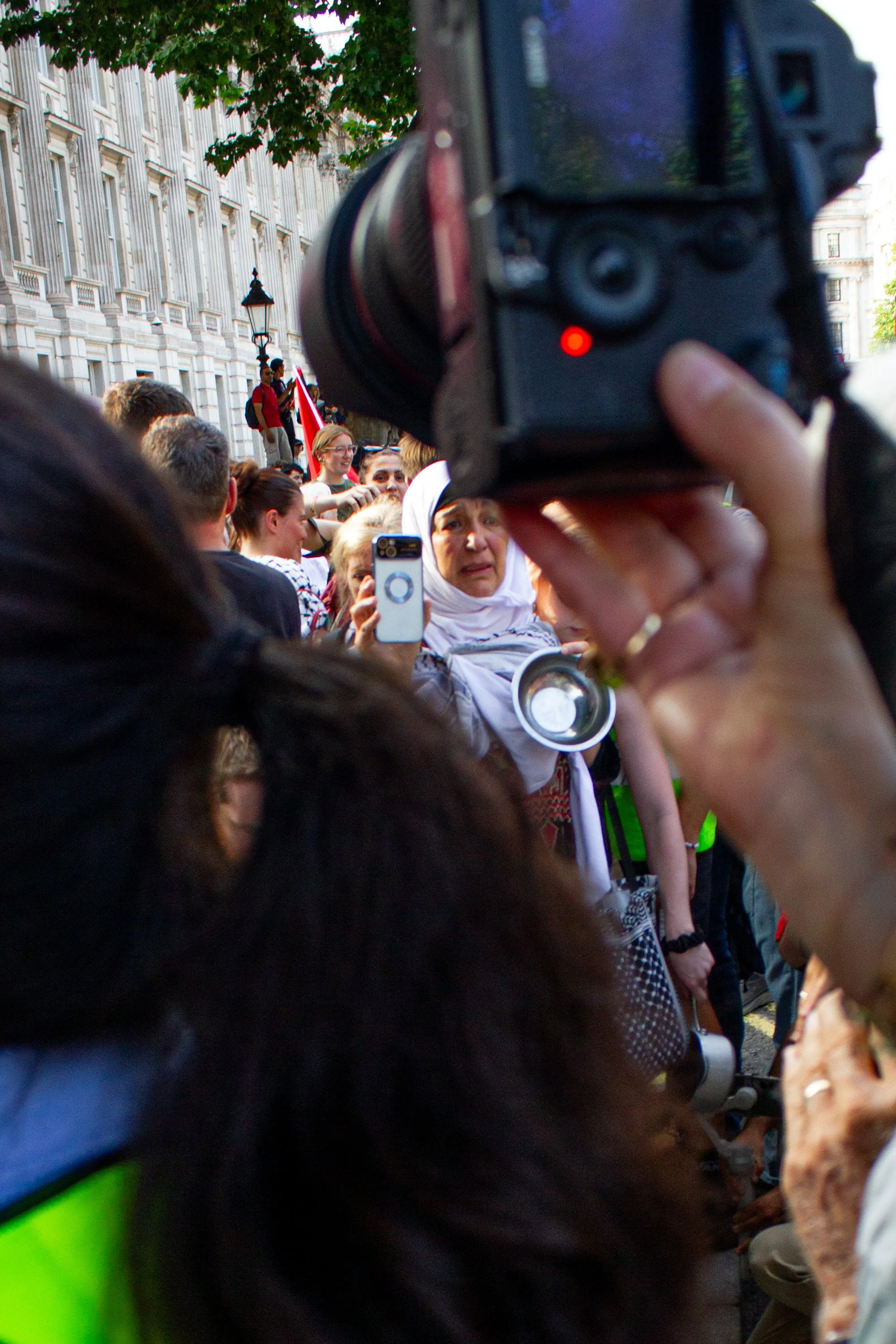 A lady at a protest in London, during which attendees brought pots and pans to symbolise the ongoing man-made famine in Gaza, 2025.