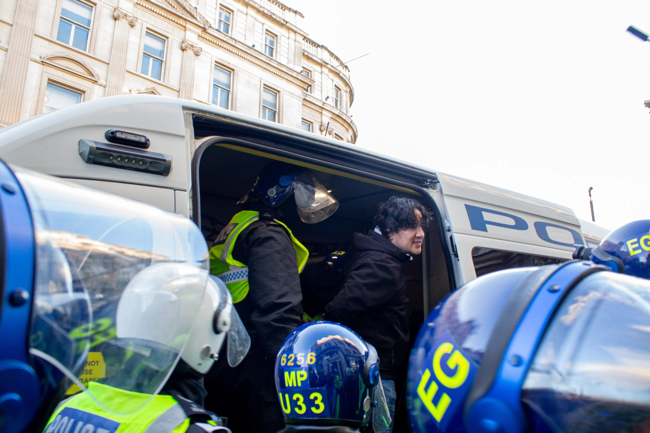 Man claims he is being arrested as an attempt to silence free speech as he is dragged into the police van.