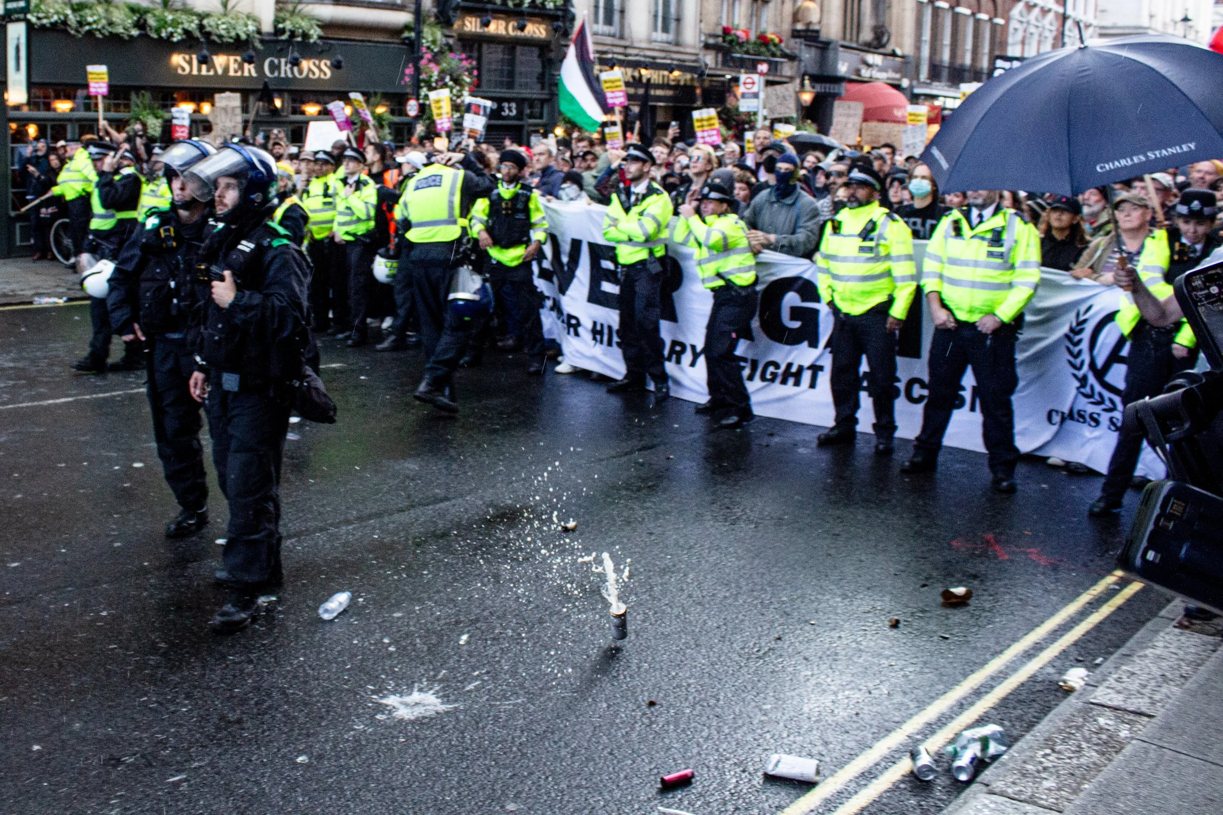 A can of beer thrown from the far-right protest towards the counter protest.