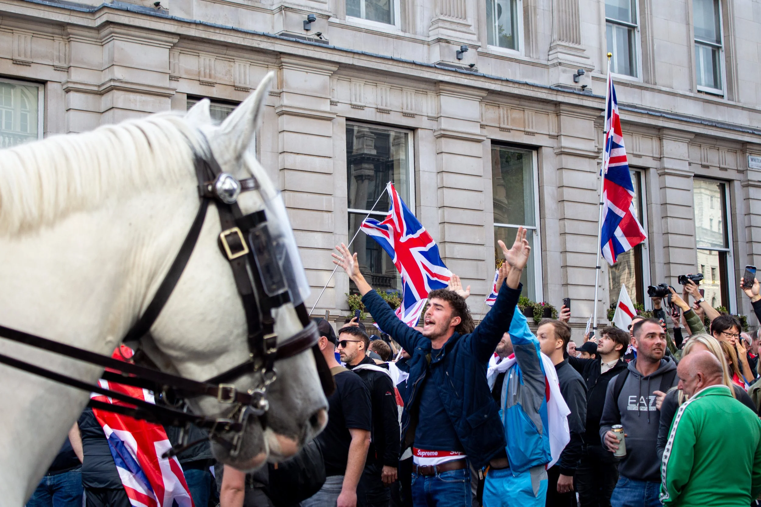 A man expresses his support for Tommy Robinson.