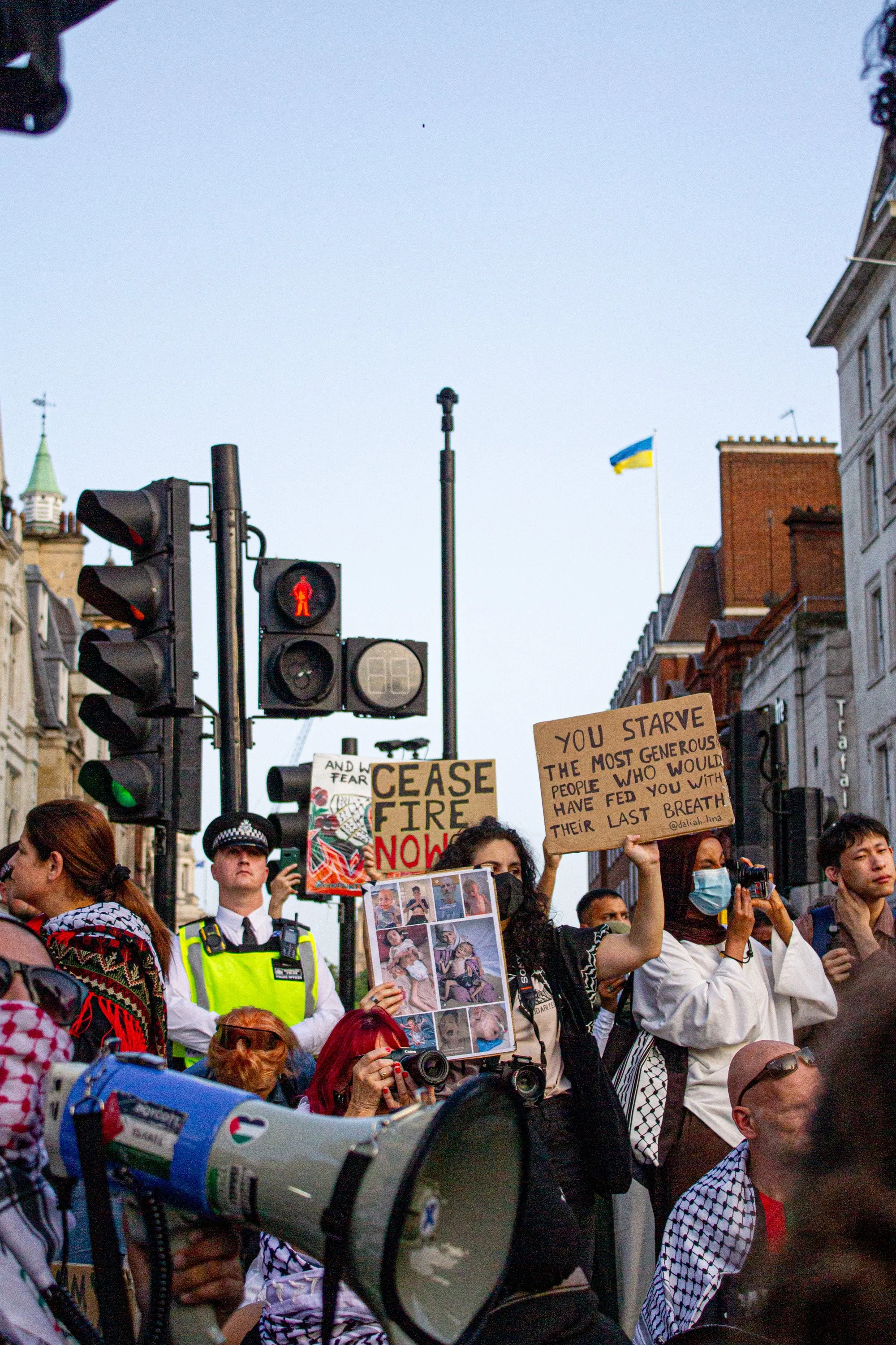 Protestors block the Trafalgar Square roundabout, protesting the UK government's complicity in the ongoing genocide and famine in Gaza, 2025. (2/2)
