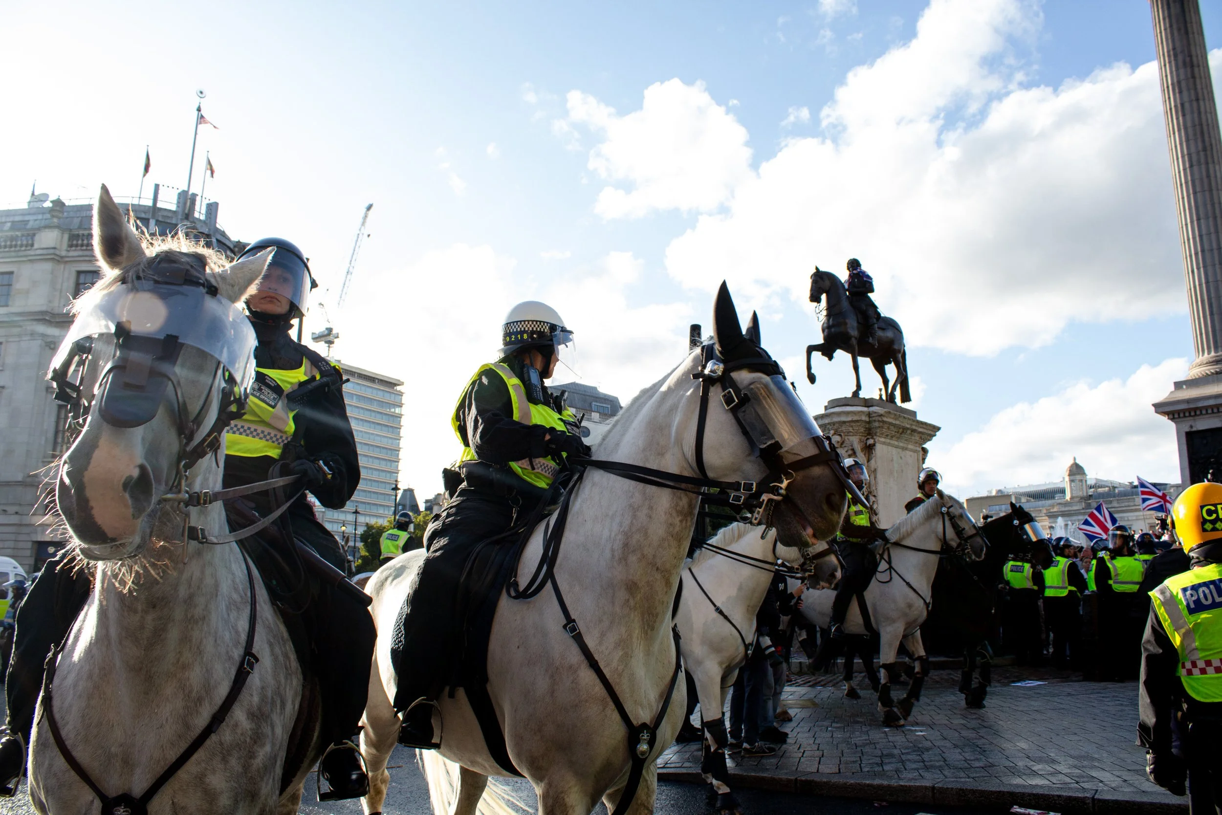 Horses advance towards crowds on Trafalgar Square, continuing to dispell the far-right numbers.