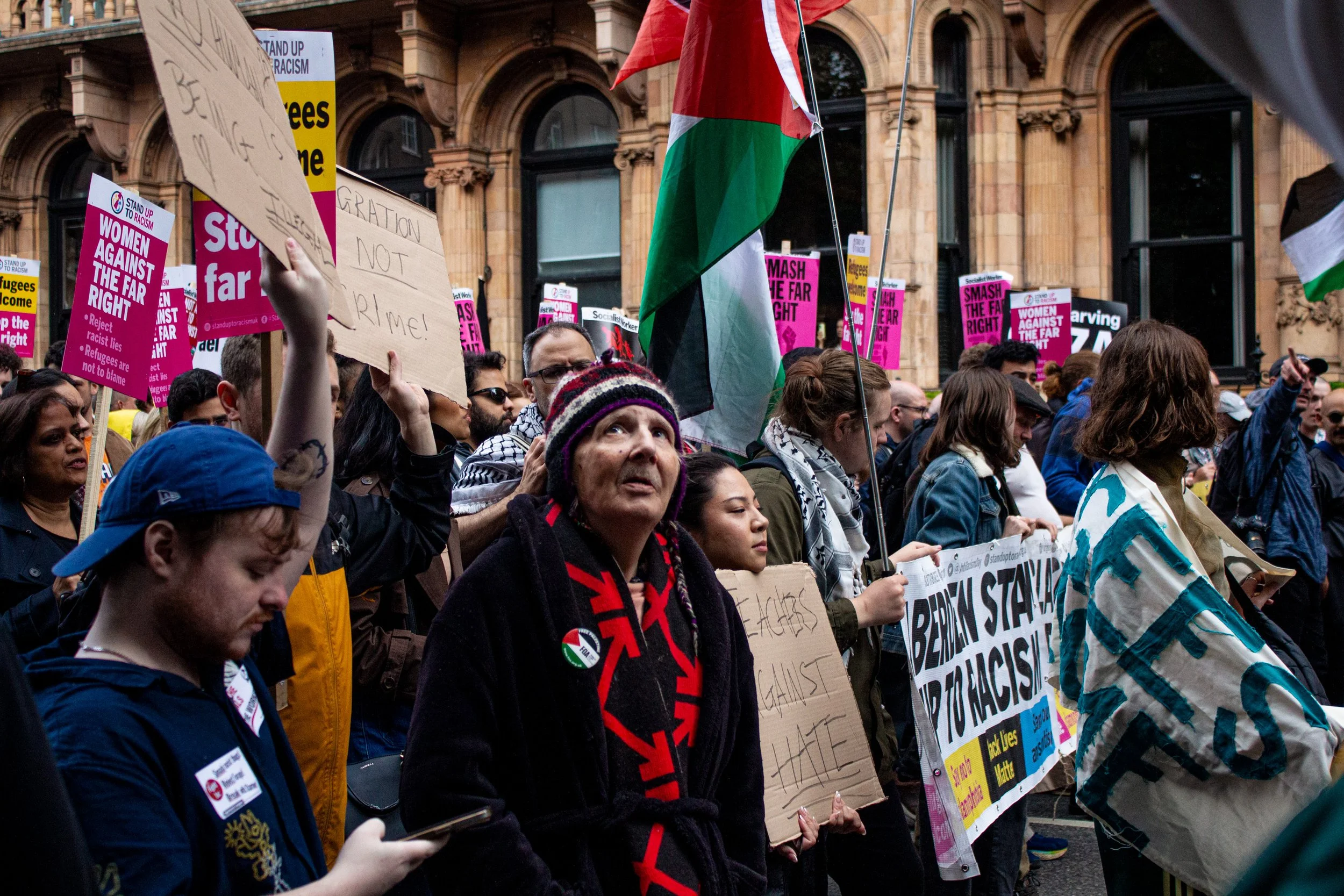 An elderly anti-racist protestor in the crowd at Russel Square.