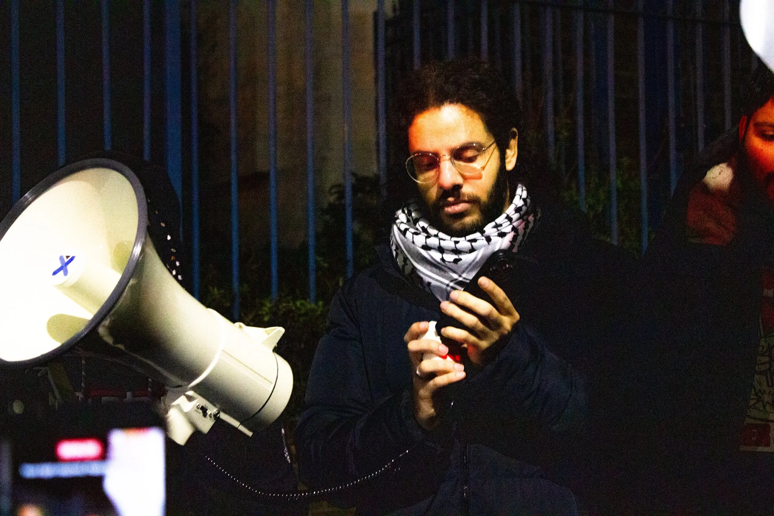 Kamran Ahmed's sister speaks to the crowd outside HMP Pentonville, 2026.