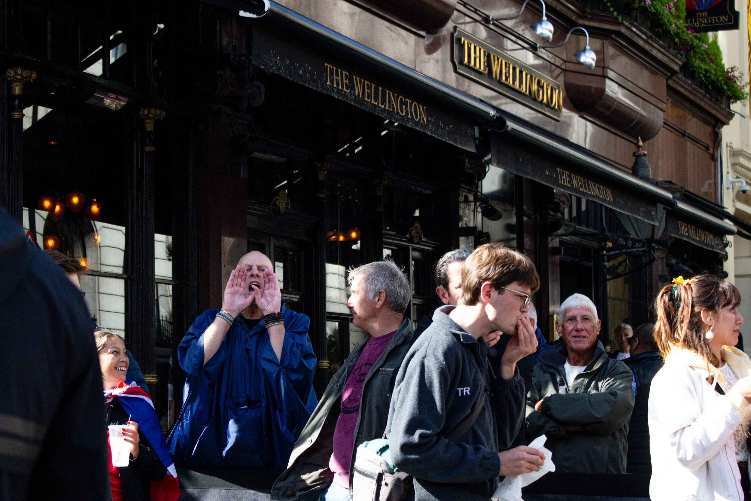 Men shout racial abuse and anti-immigrant slogans at the photographer and other people of colour in the counter protest.
