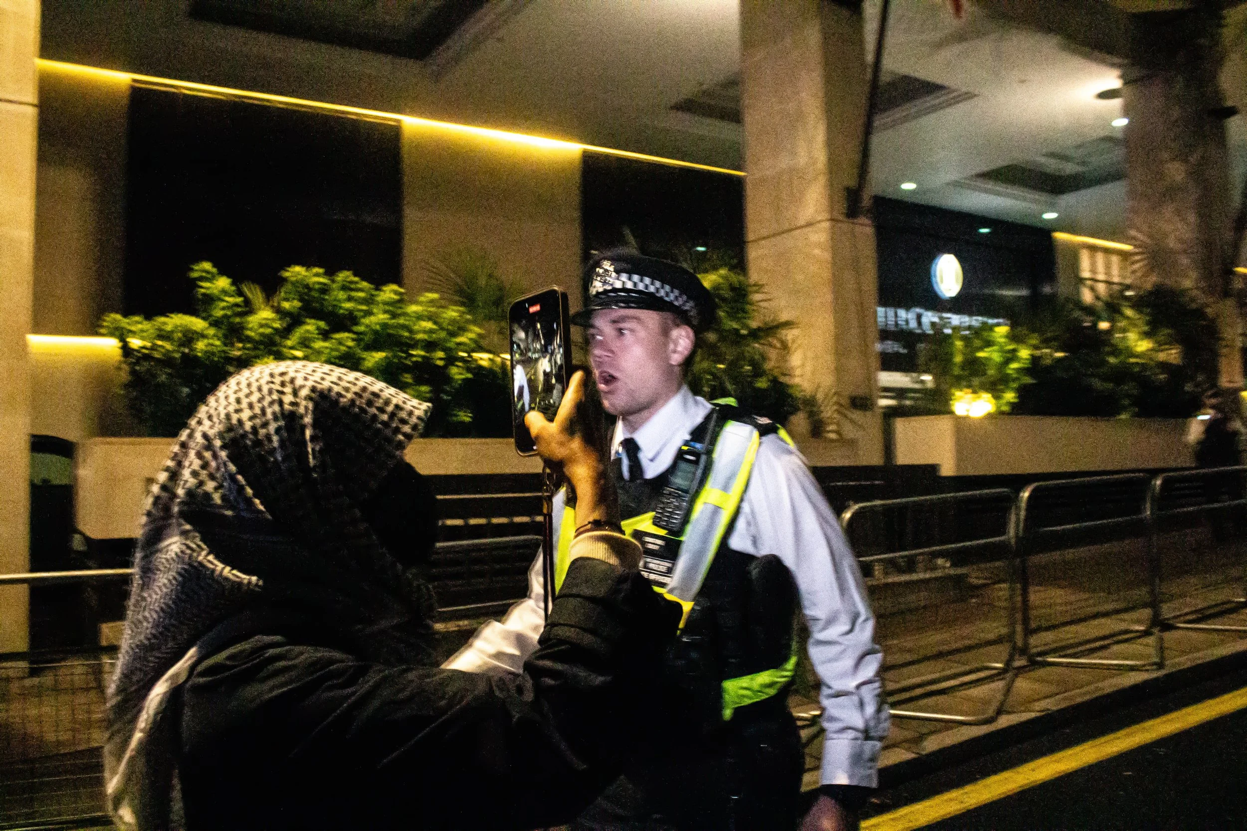 Police force protestors away from the Intercontinetal Hotel, where Herzog was staying, invoking the Section 14 order, 2025. (2/3)