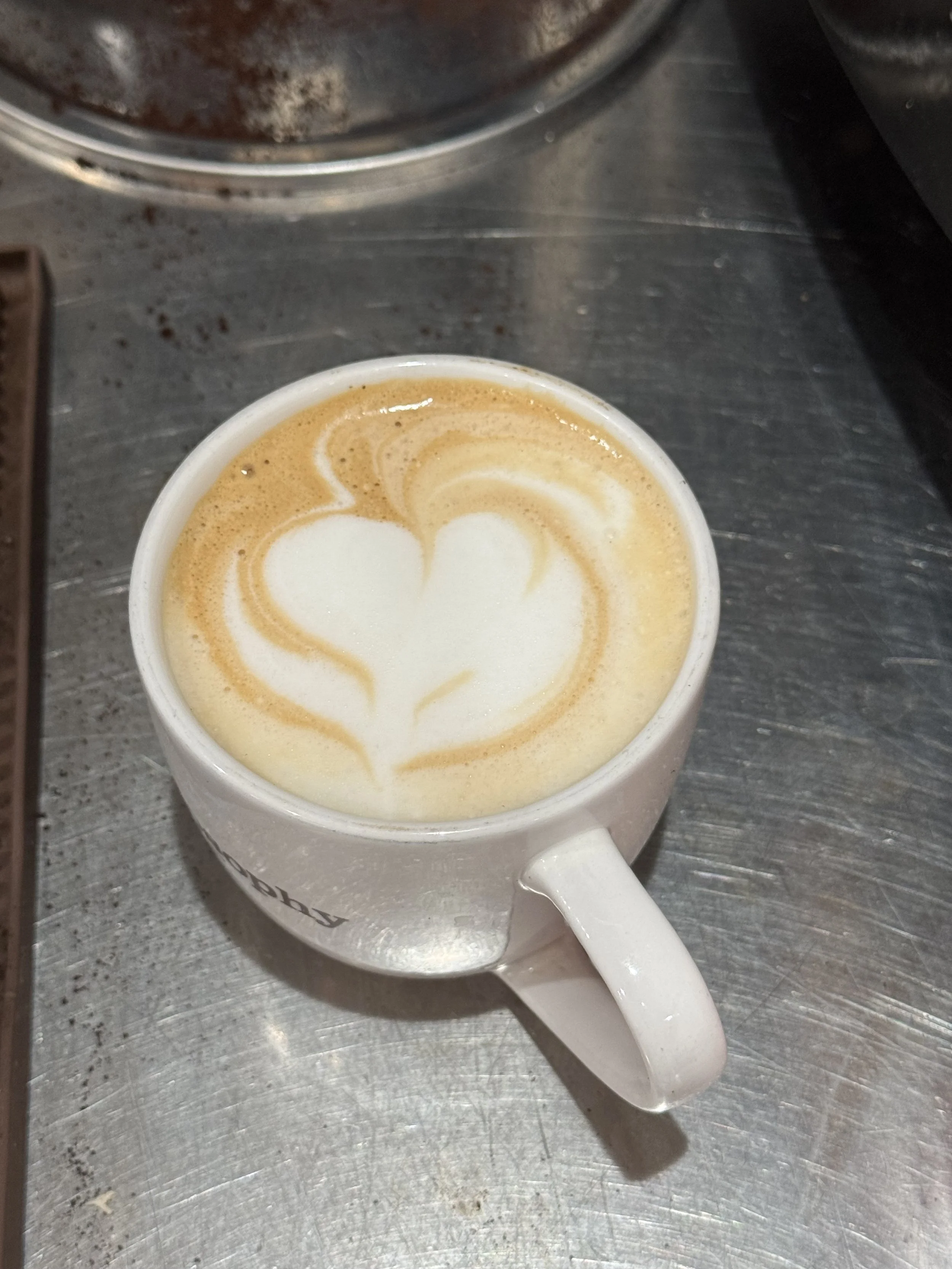 Latte with rosette/heart